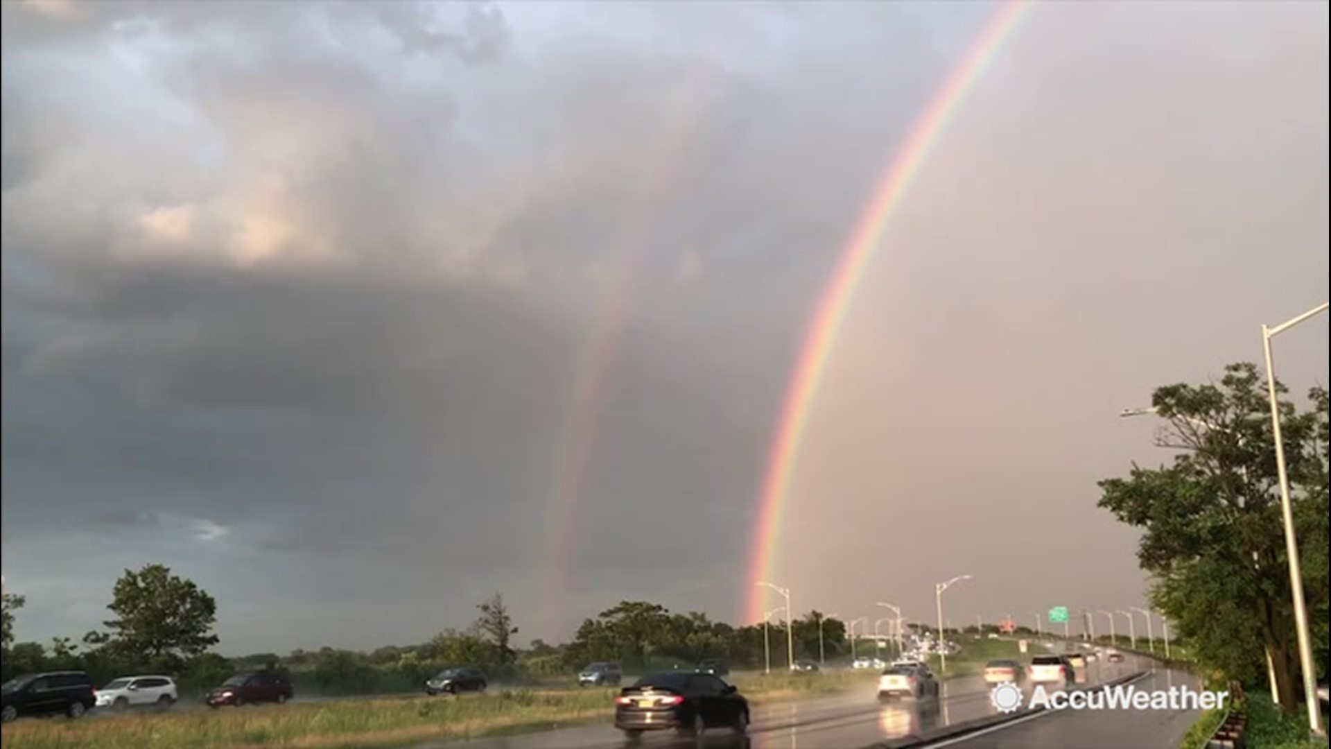 Even after having to put up with heavy rain on August 9, residents of Brooklyn, New York were able to smile as dual rainbows shined above the borough.