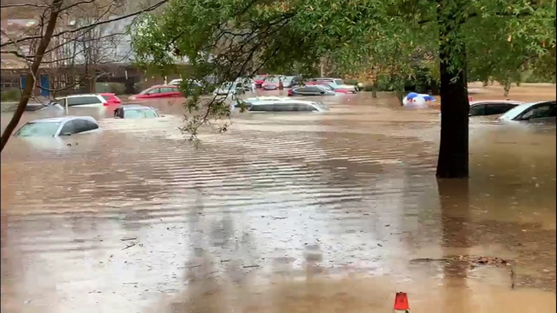 Flash flooding submerged cars, washed away bridges and led to evacuations across several regions of western North Carolina on Nov. 12.