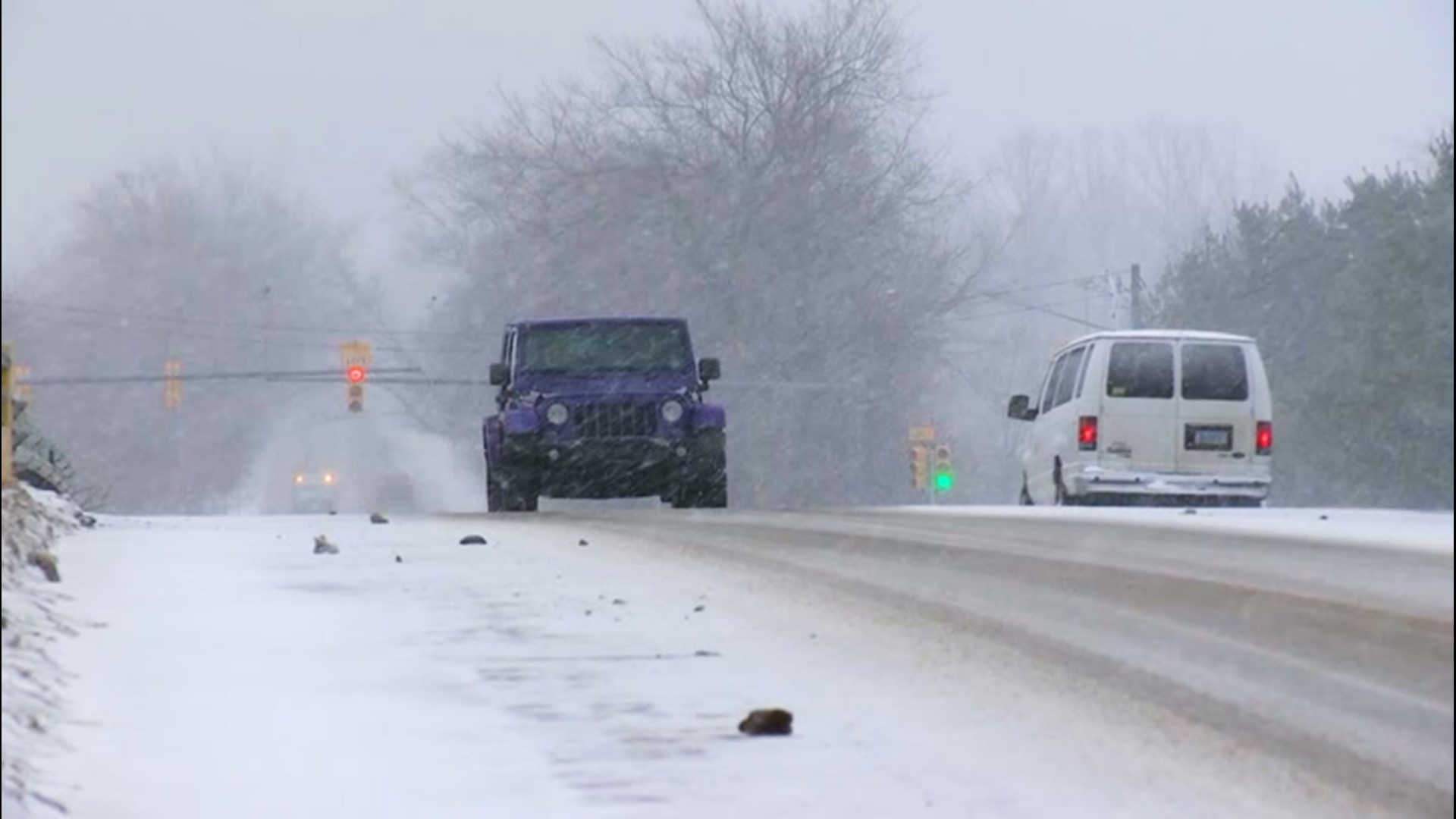 A Winter Weather Advisory was in place in Kalamazoo, Michigan, on the night of Feb. 9 into the next morning as roads were covered in snow.