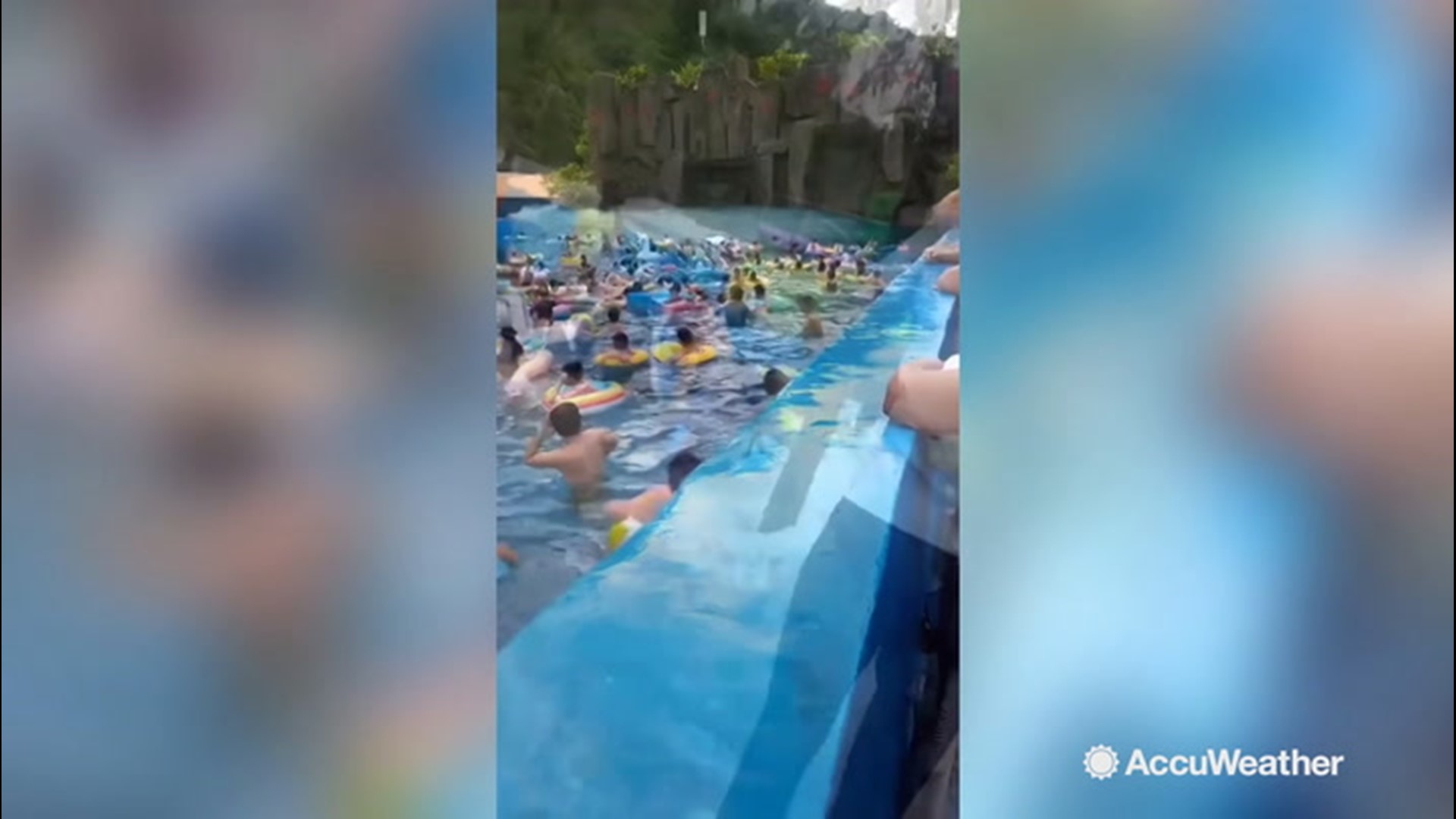 This terrifying scene shows a massive wave sweeping tourists the Shuiyun Water Park in northern China on July 29.  The wave was caused by a malfunction to the wave machine.  44 people were injured.