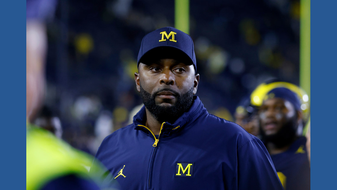Sherrone Moore charged with stalking, home invasion after being fired as Michigan football coach | king5.com