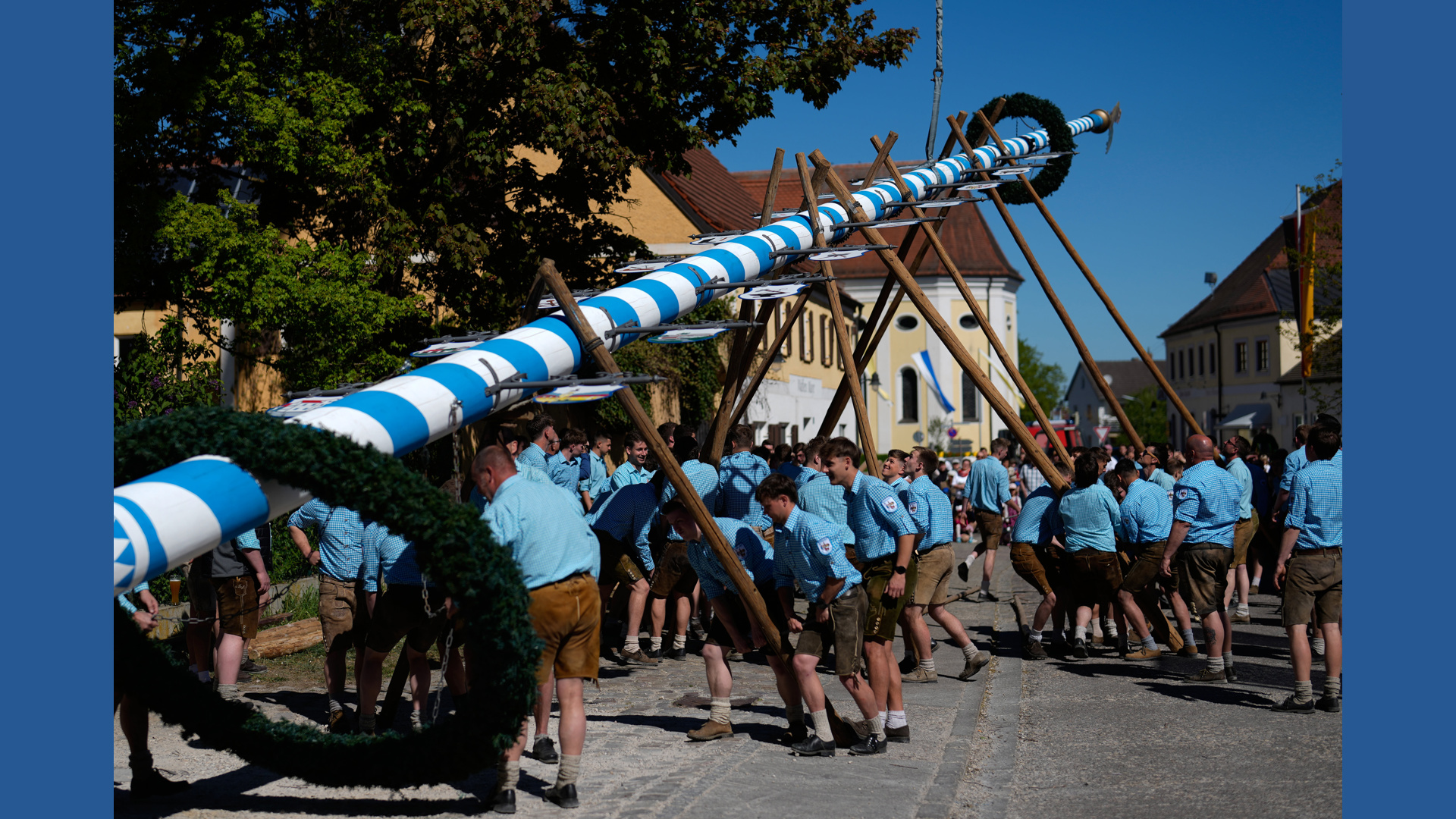 Beer, music and shouts of 'Hau-Ruck' as a Bavarian village raises its ...