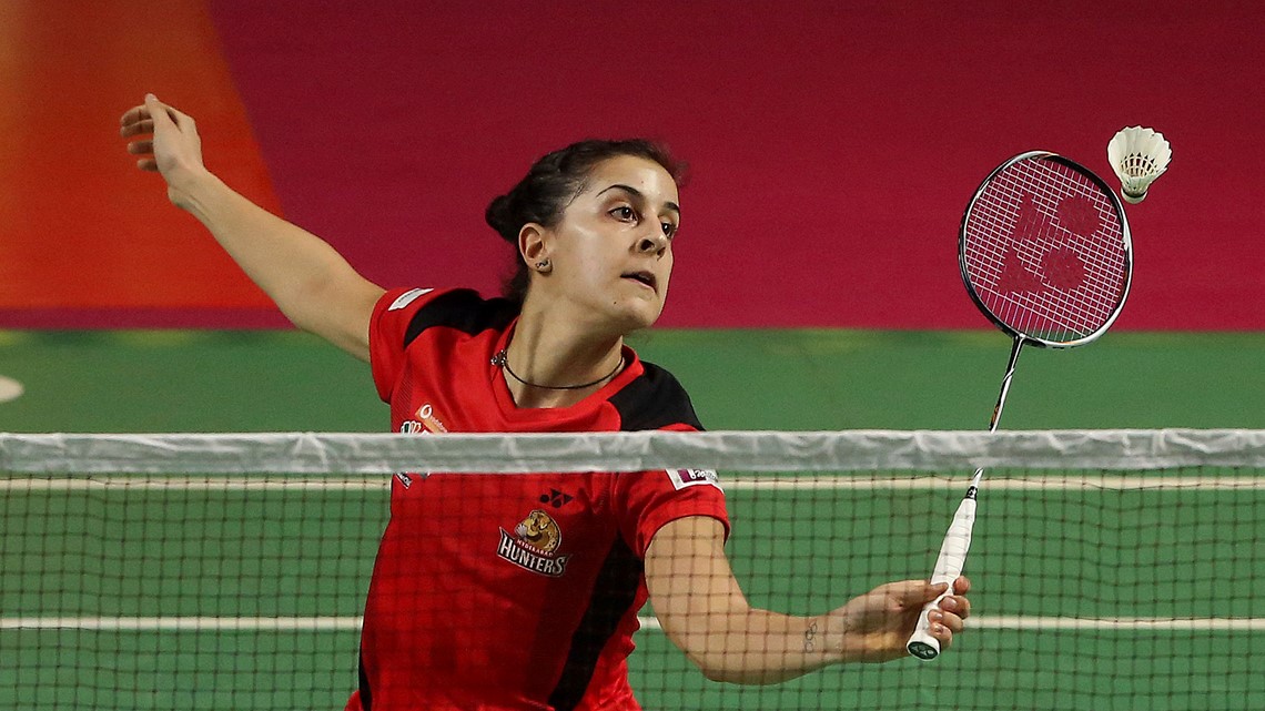 How is badminton scored on the Olympics?