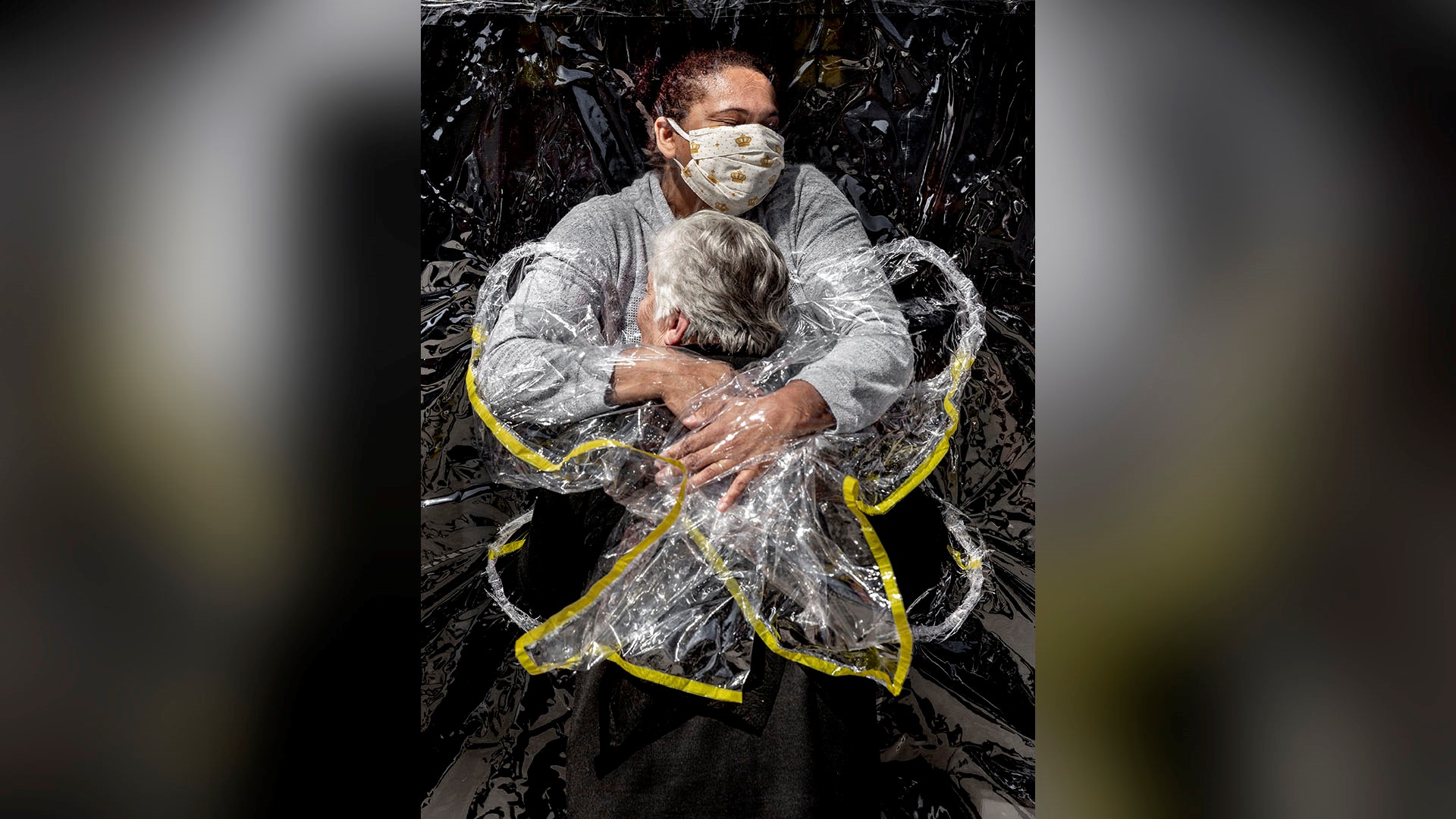 Coronavirus 'hug curtain' photo wins worldwide award