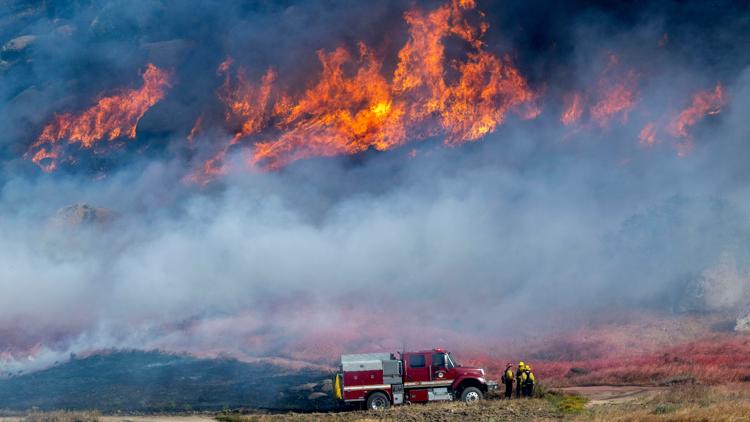 Fast-growing wildfire in windy Southern California triggers evacuations