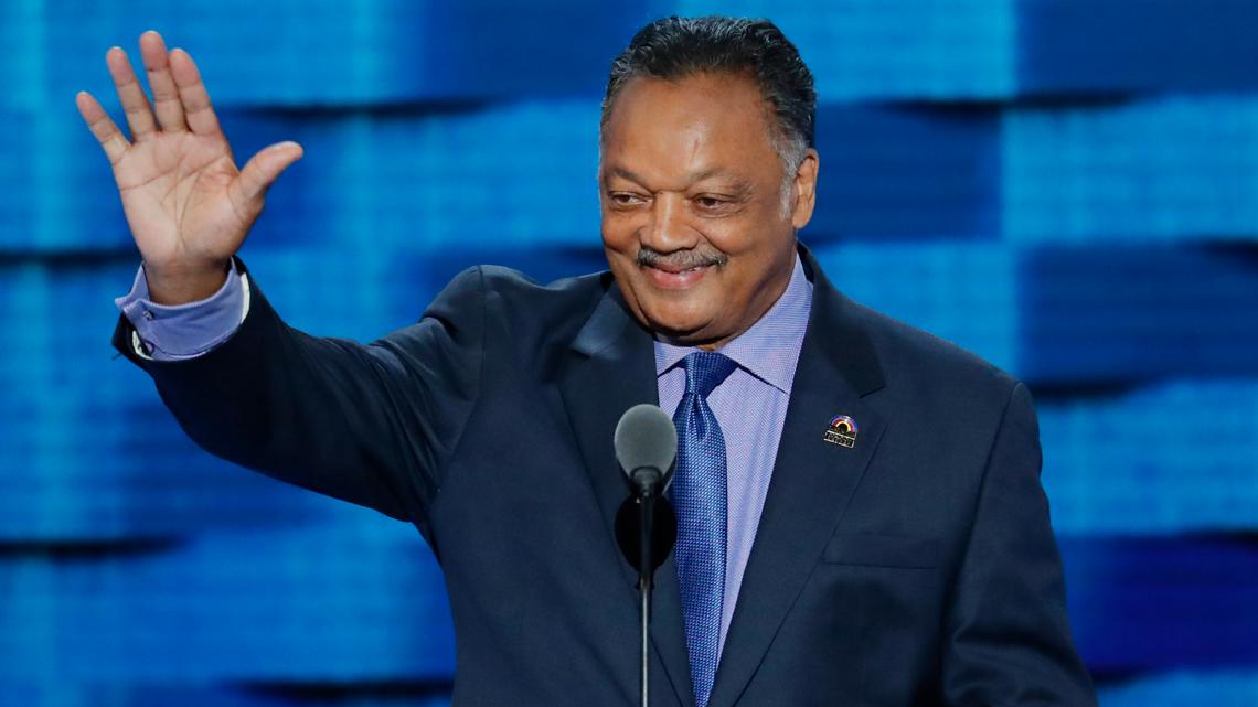 FILE - Rev. Jesse Jackson waves as he steps to the podium during the third day of the Democratic National Convention in Philadelphia, July 27, 2016.