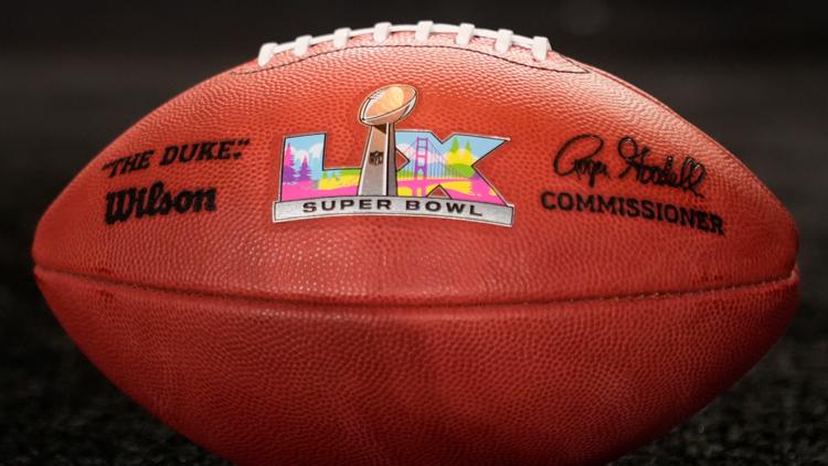 A ceremonial football with the Super Bowl 60 logo sits on the stage after a news conference the morning after Super Bowl 59, Feb. 10, 2025.