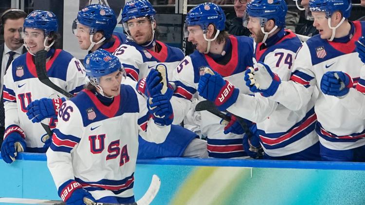 United States' Jack Hughes (86) celebrates after scoring in the semifinal game against Slovakia at the 2026 Winter Olympics. (AP Photo/Hassan Ammar)