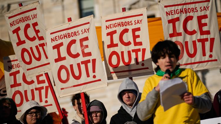 Protesters gather in front of the Minnesota State Capitol in response to the death of Renee Good, Jan. 14, 2026, in St. Paul, Minn