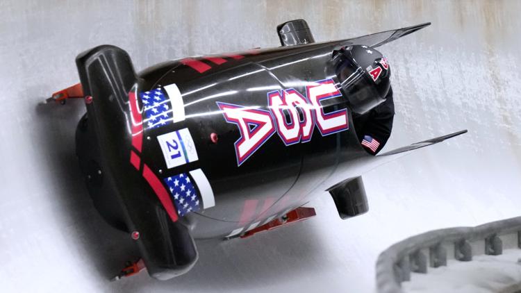 United States' Elana Meyers Taylor, front, slides down the track during a two women bobsled training session, Feb. 19, 2026. (AP Photo/Aijaz Rahi)