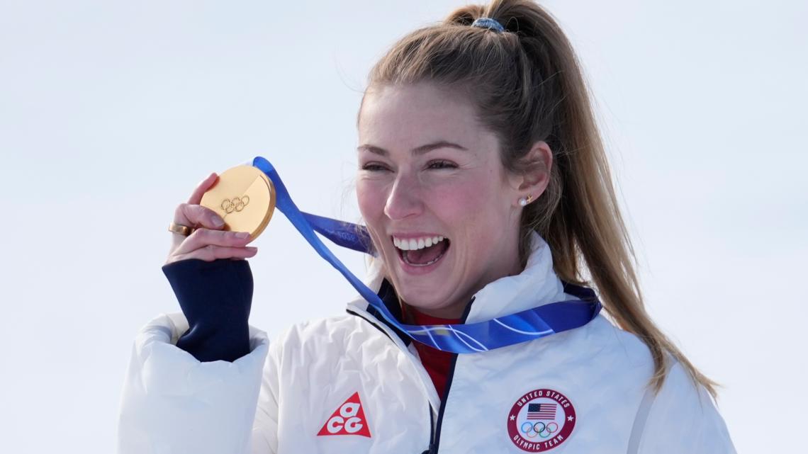 United States' Mikaela Shiffrin shows her gold medal of the alpine ski, women's slalom race, at the 2026 Winter Olympics.