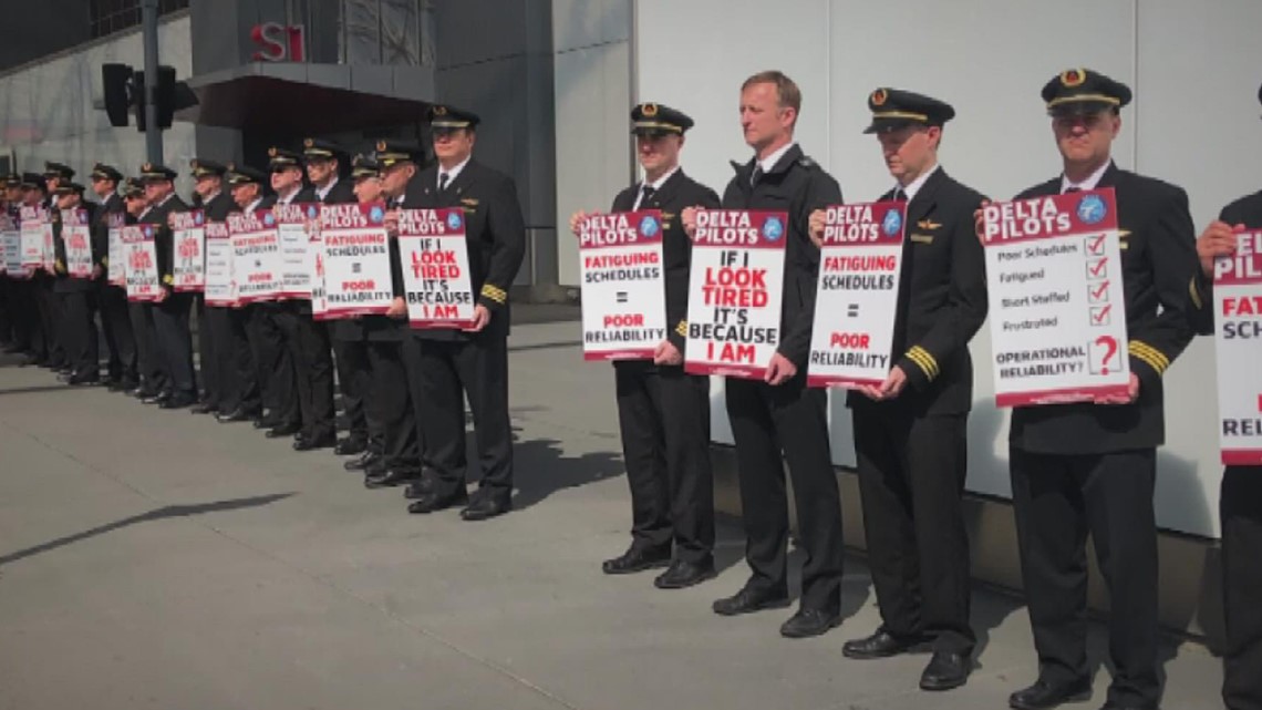 to picket at Sea-Tac Airport Tuesday | king5.com