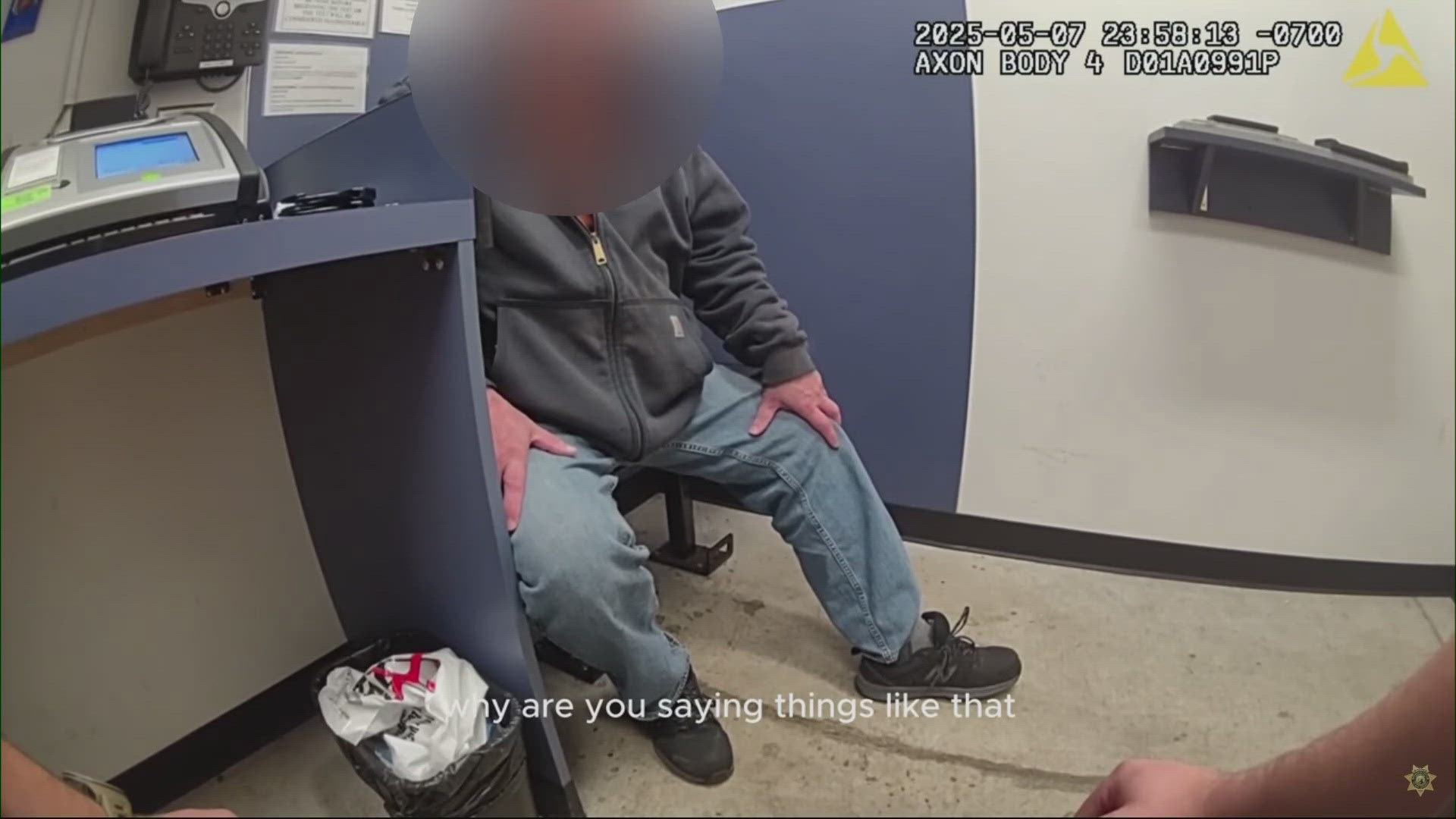 The video shows the suspect, Marc Fogel, attacking Deputy Bryson Layton inside a small Washington State Patrol exam room, where the deputy stabbed him multiple times