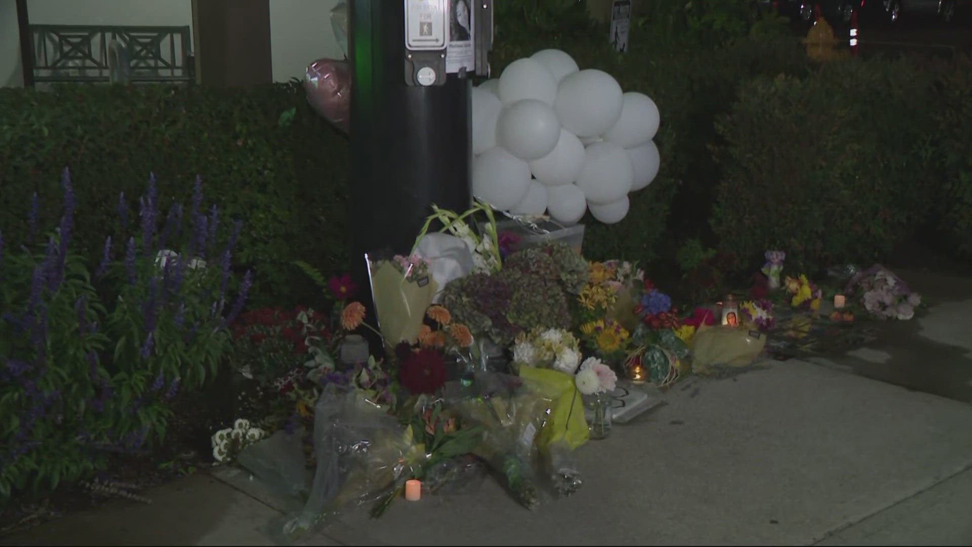 Neighbors are shocked at the murder of 32-year-old Melissa Jubane. A makeshift memorial has been set up outside her apartment building.