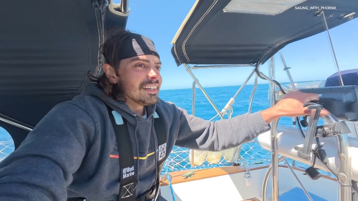 Man goes viral for quitting job, buying a boat and sailing to Hawaii with his cat
