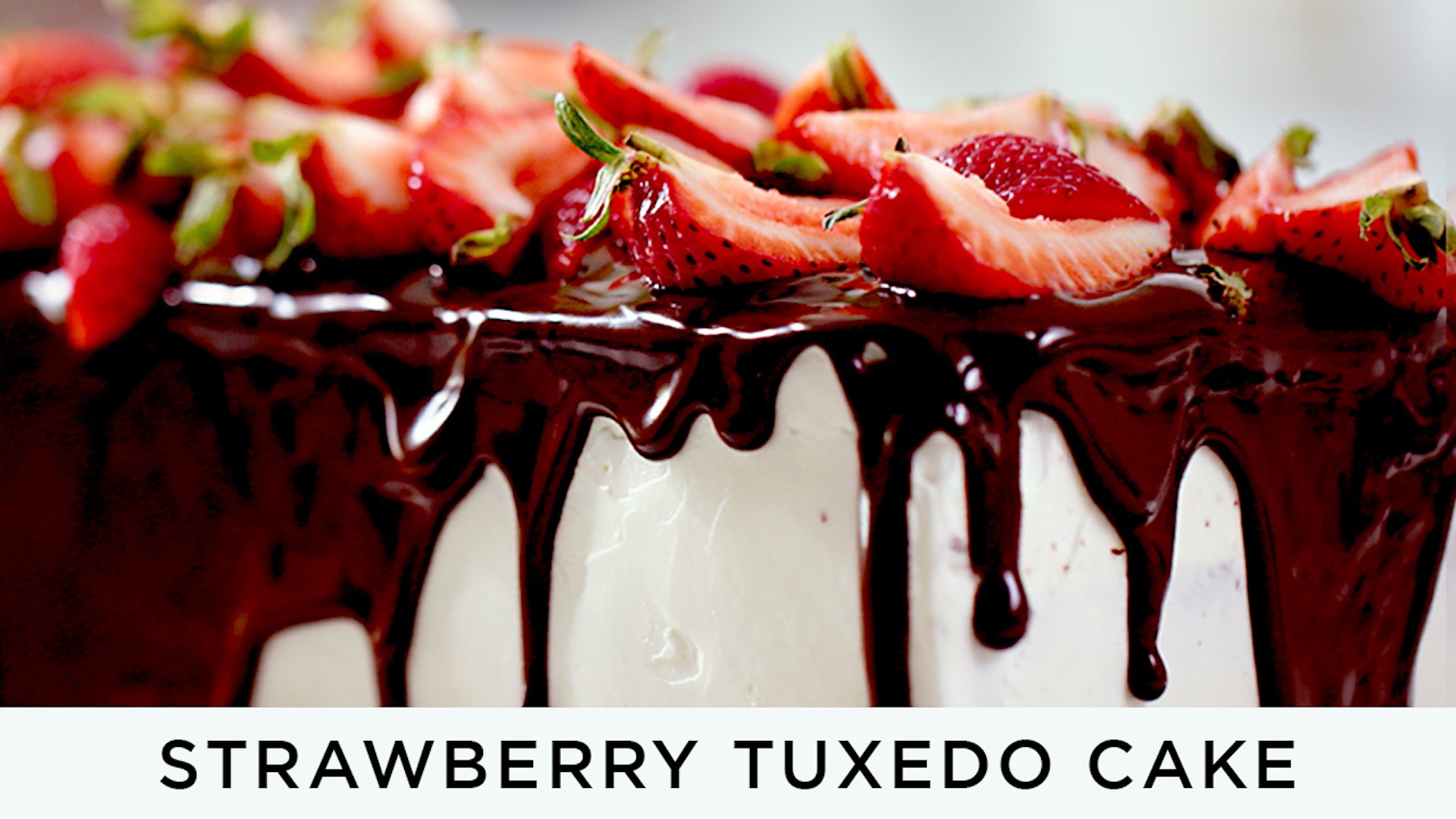 You need this in your life right now! Learn how to make a decadent 4 layered cake covered in chocolate ganache and fresh strawberries