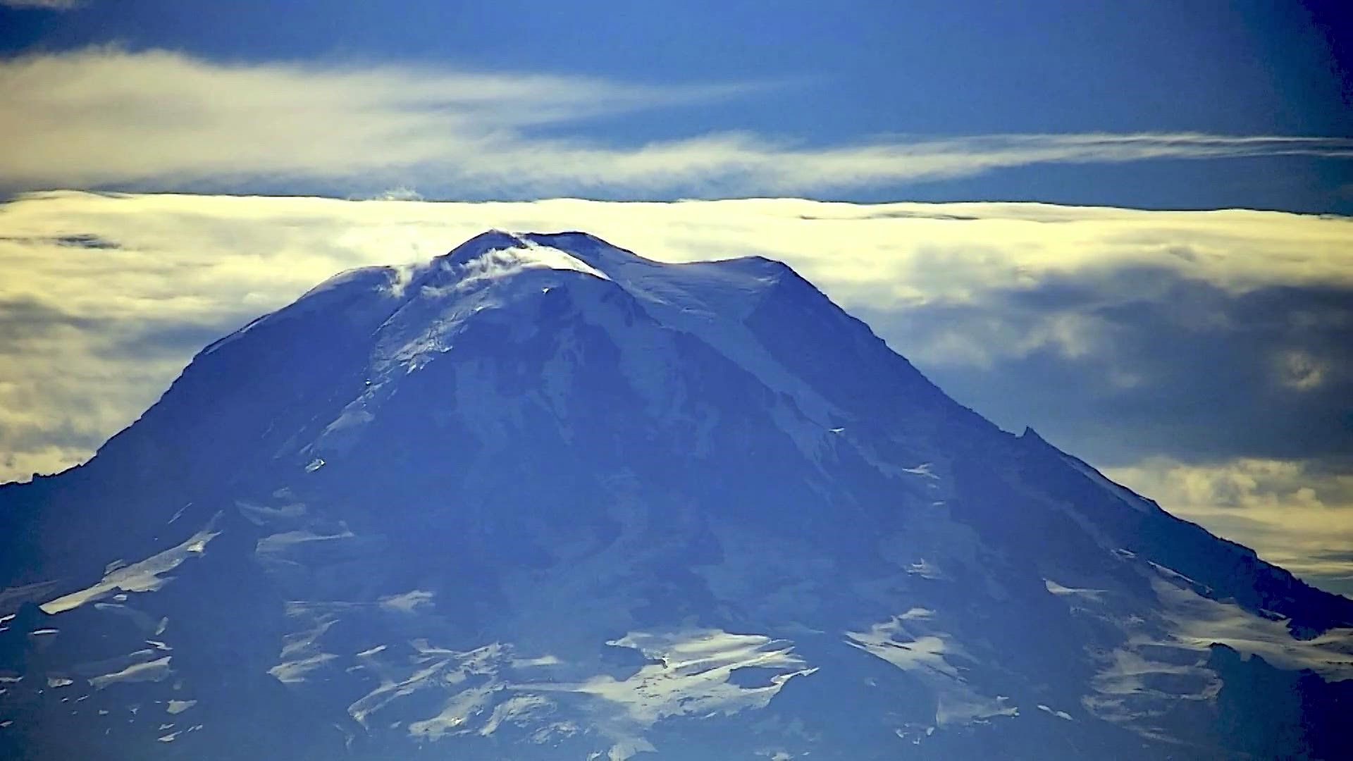 A lenticular cloud enveloped Mount Rainier, which made the mountain appear to be venting from certain angles. But the U.S. Geological Survey says that isn't the case