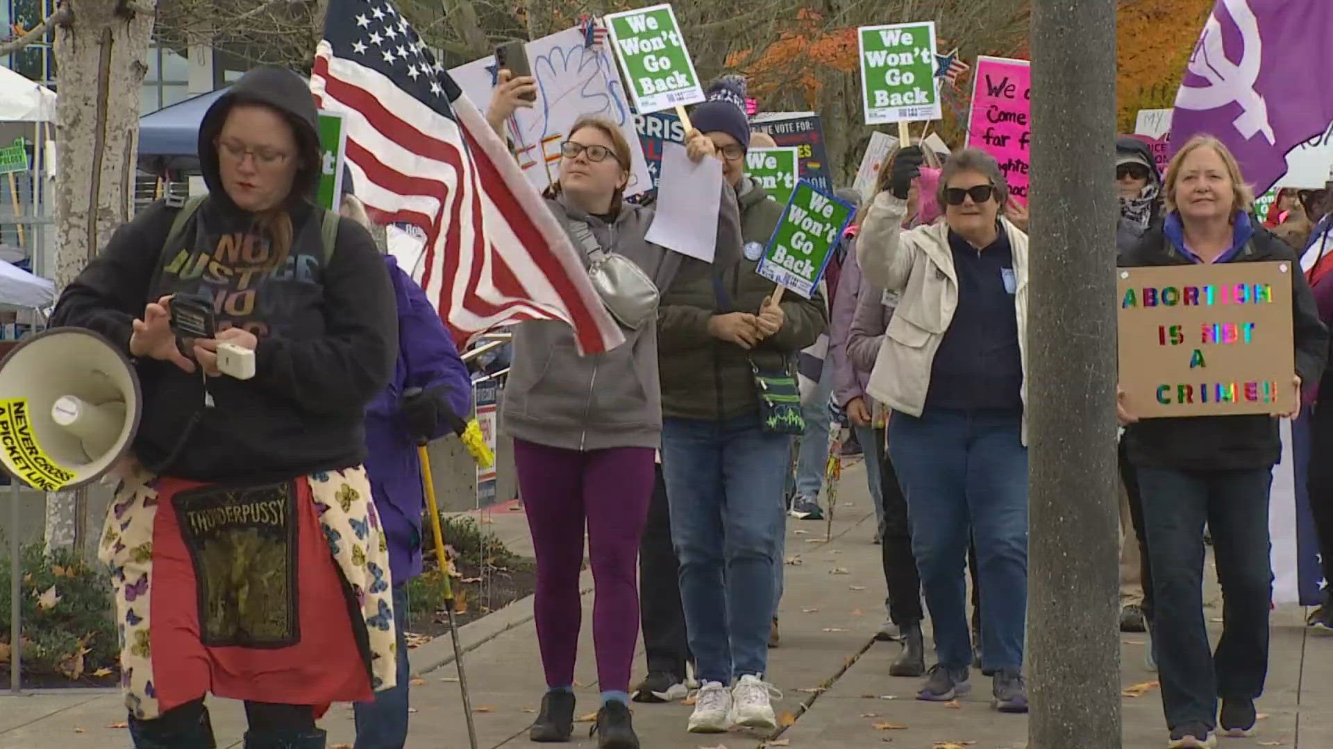 Nearly 200 marched in Everett for women's rights and to encourage people to vote just days ahead of the general election. 