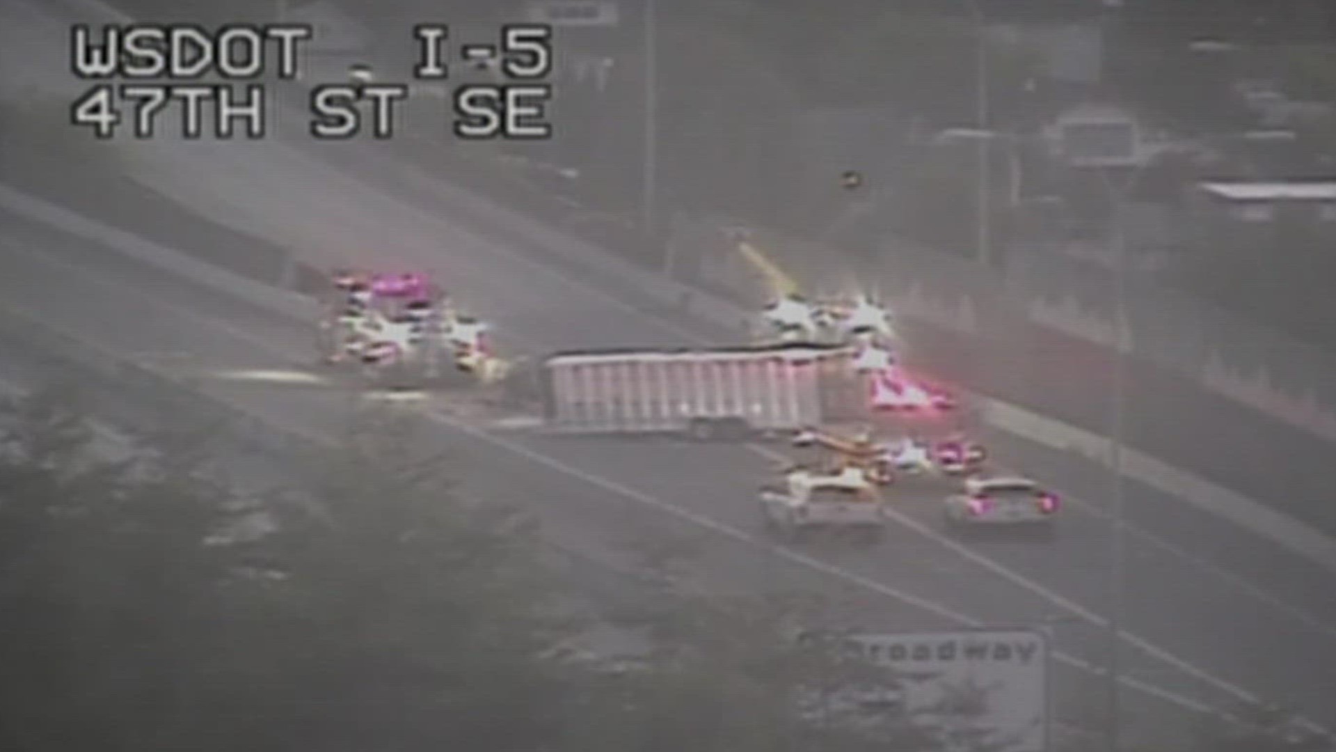 A crashed trailer carrying live cattle is blocking the offramp to Broadway on I-5 in Everett