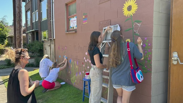 Queen Anne Christian Church covers graffiti scar with wildflower mural