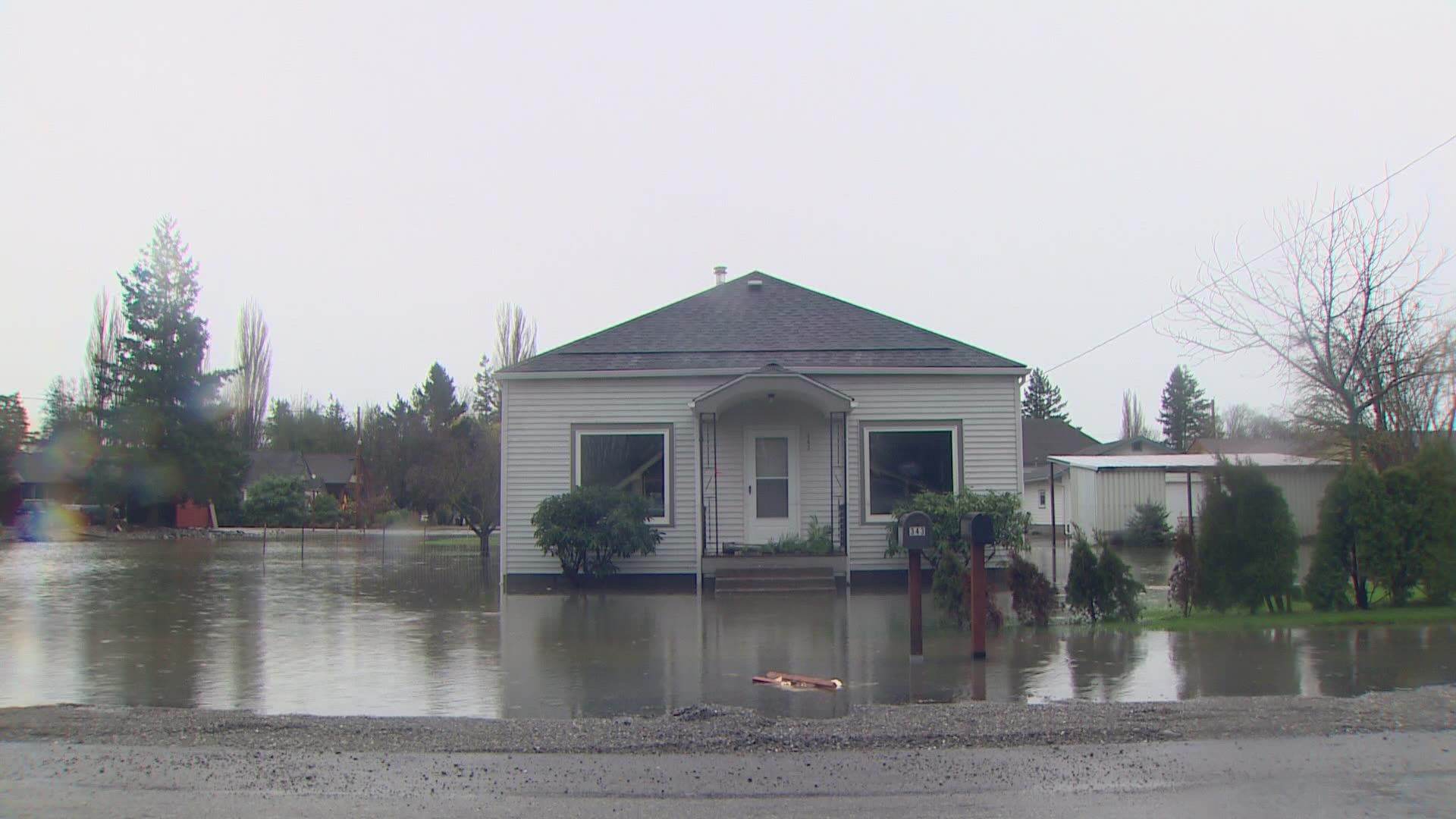 Cities like Sumas continue to deal with flooding as heavy rain continues to cause rivers to swell.