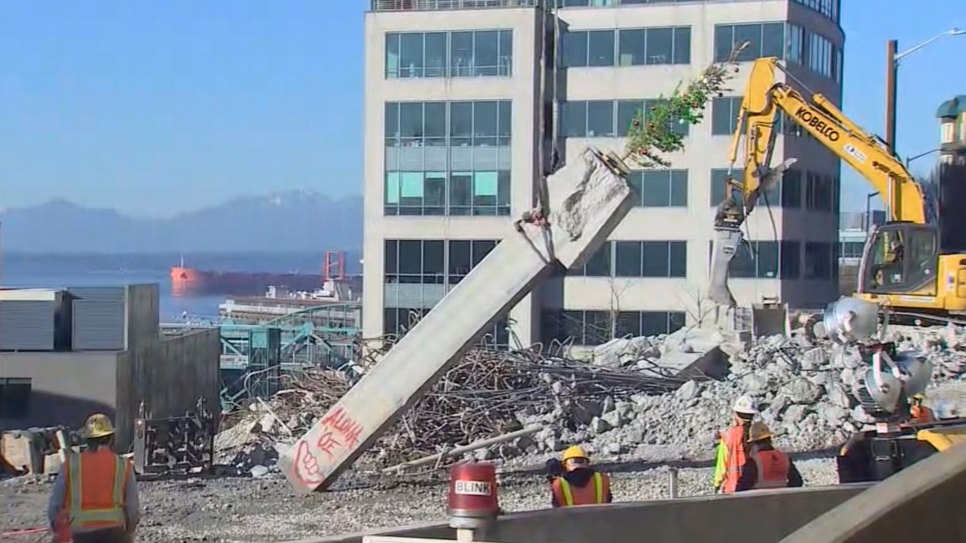 Crews demolished the last piece of the Seattle viaduct near Lenora Street on Thursday morning.