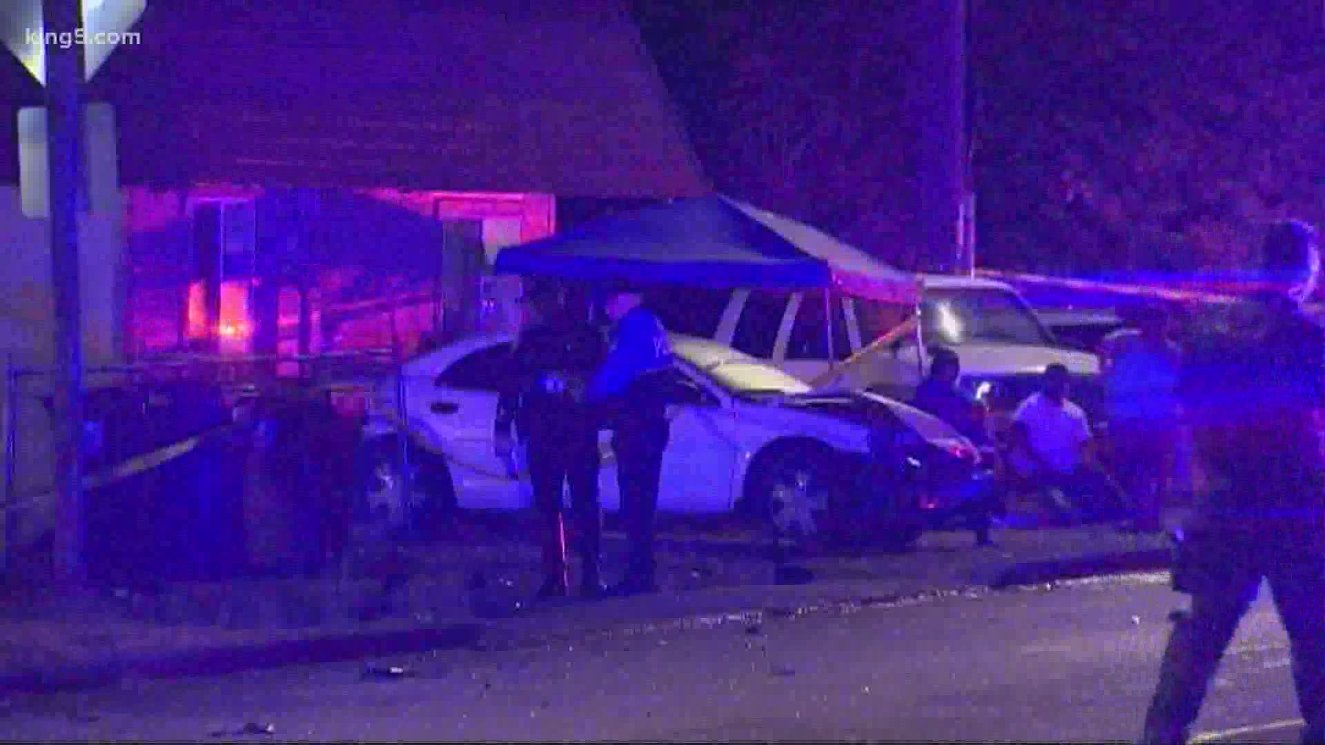 Two people are dead after a speeding car crashed into a parked car in Tacoma’s Fern Hill neighborhood late Thursday night.