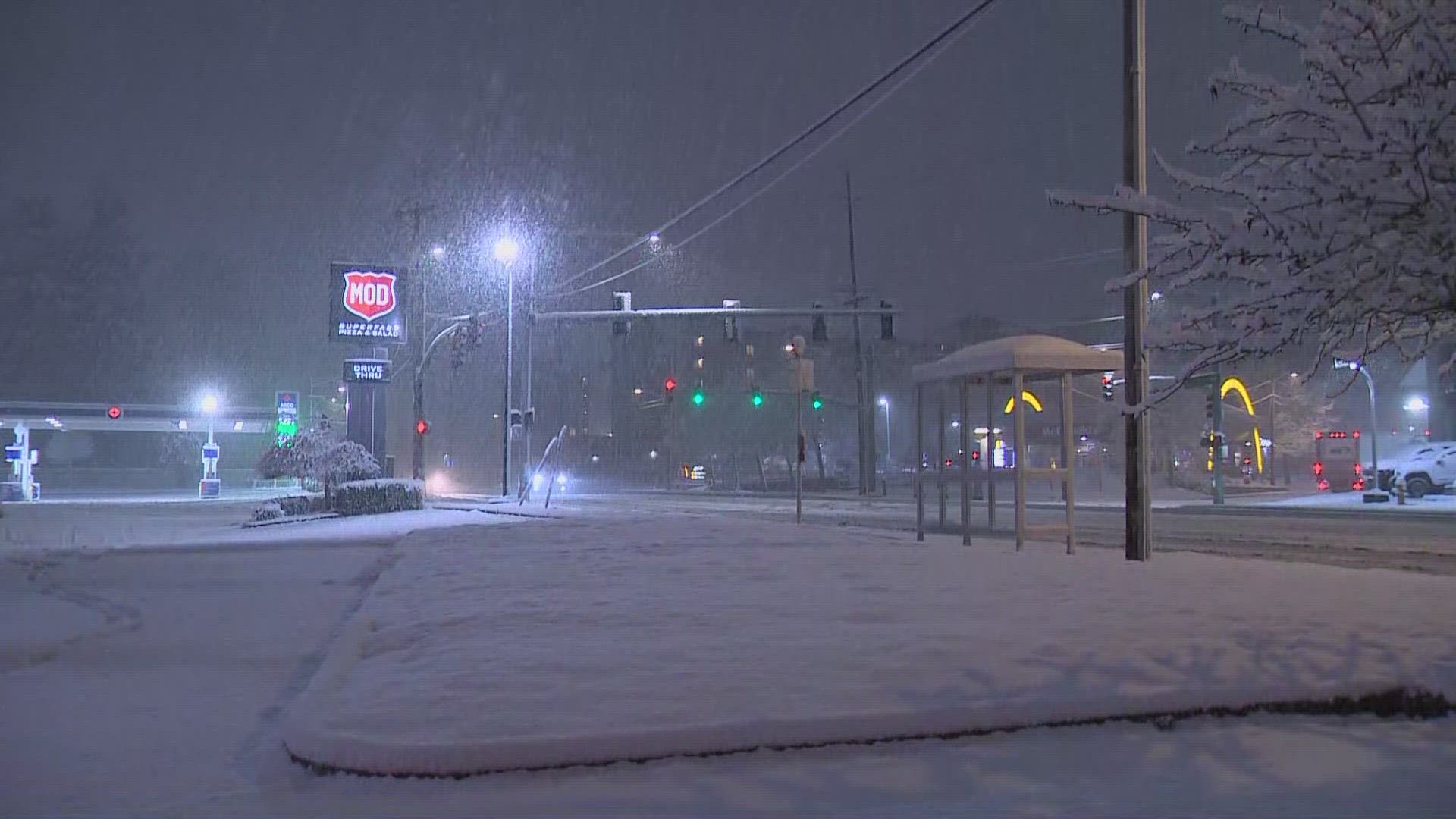 Snow and slush continue to be a factor for drivers in Everett and over the mountain passes