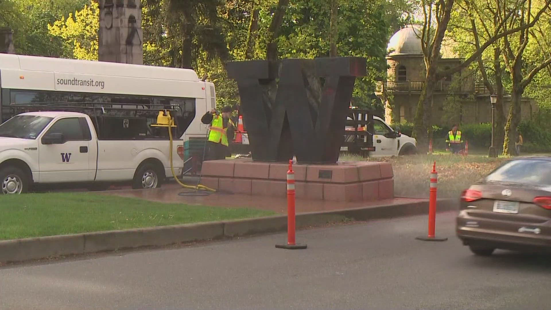 Crews had to pressure wash the W at the entrance of UW campus after vandals poured red paint on it