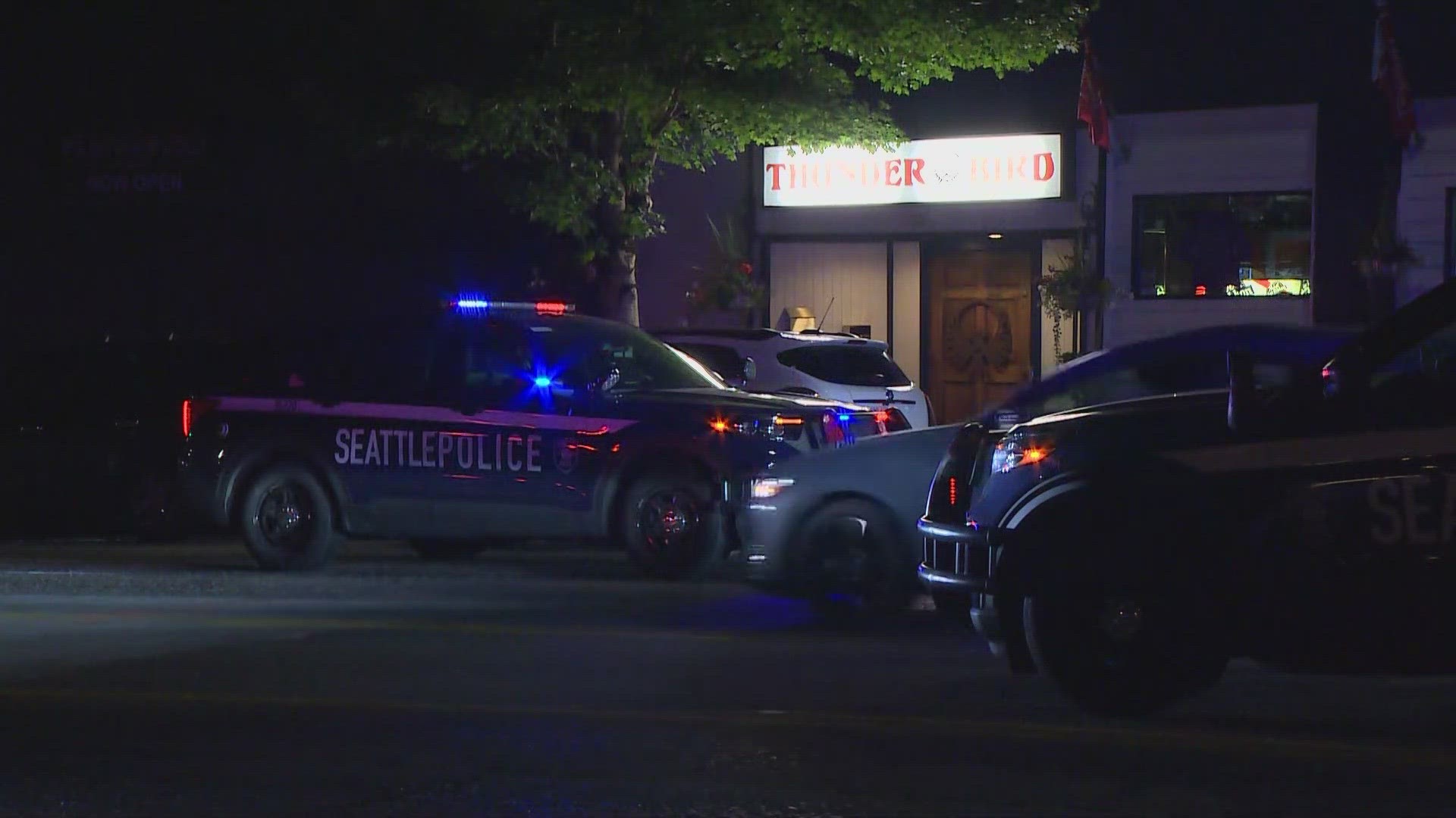 A suspect is in police custody following the shooting of two men outside the Thunderbird Tavern in Ballard