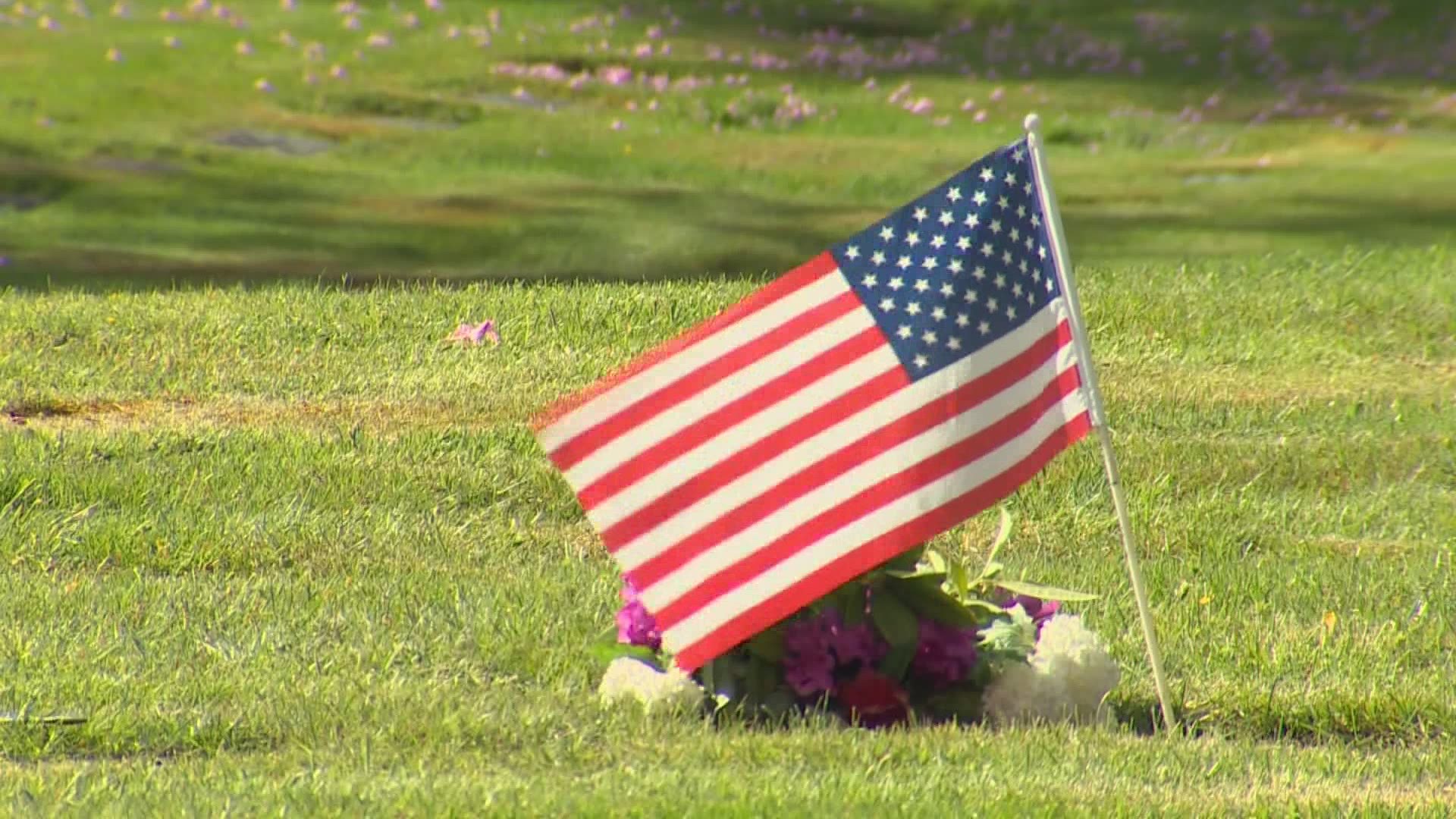 Lakewood's Mountain View Memorial Park invited volunteers to place flags at the graves of military members and will host a ceremony with full military honors Monday.