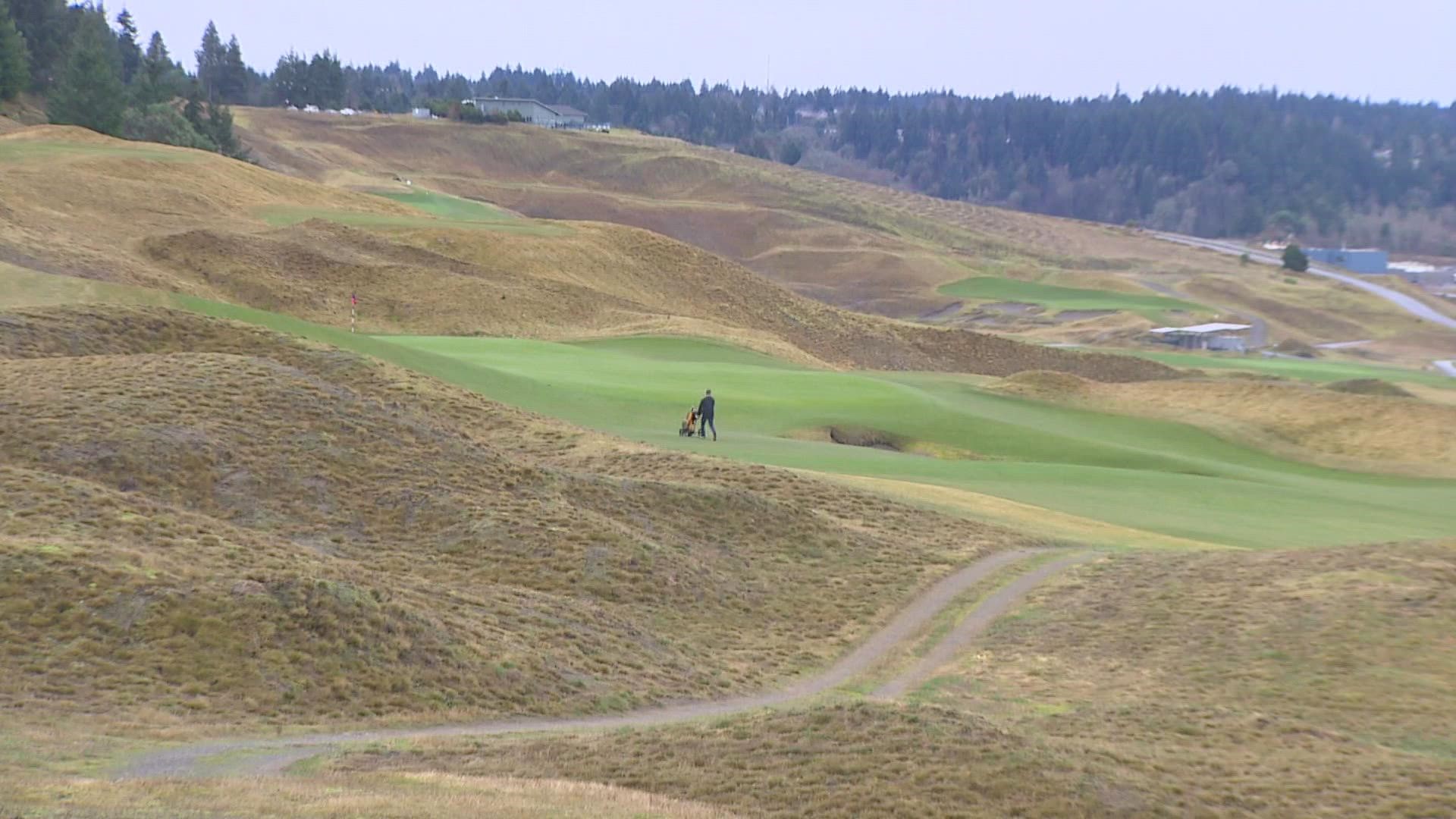 Pierce County officials said it will continue the work to bring new golf amenities to Chambers Bay.
