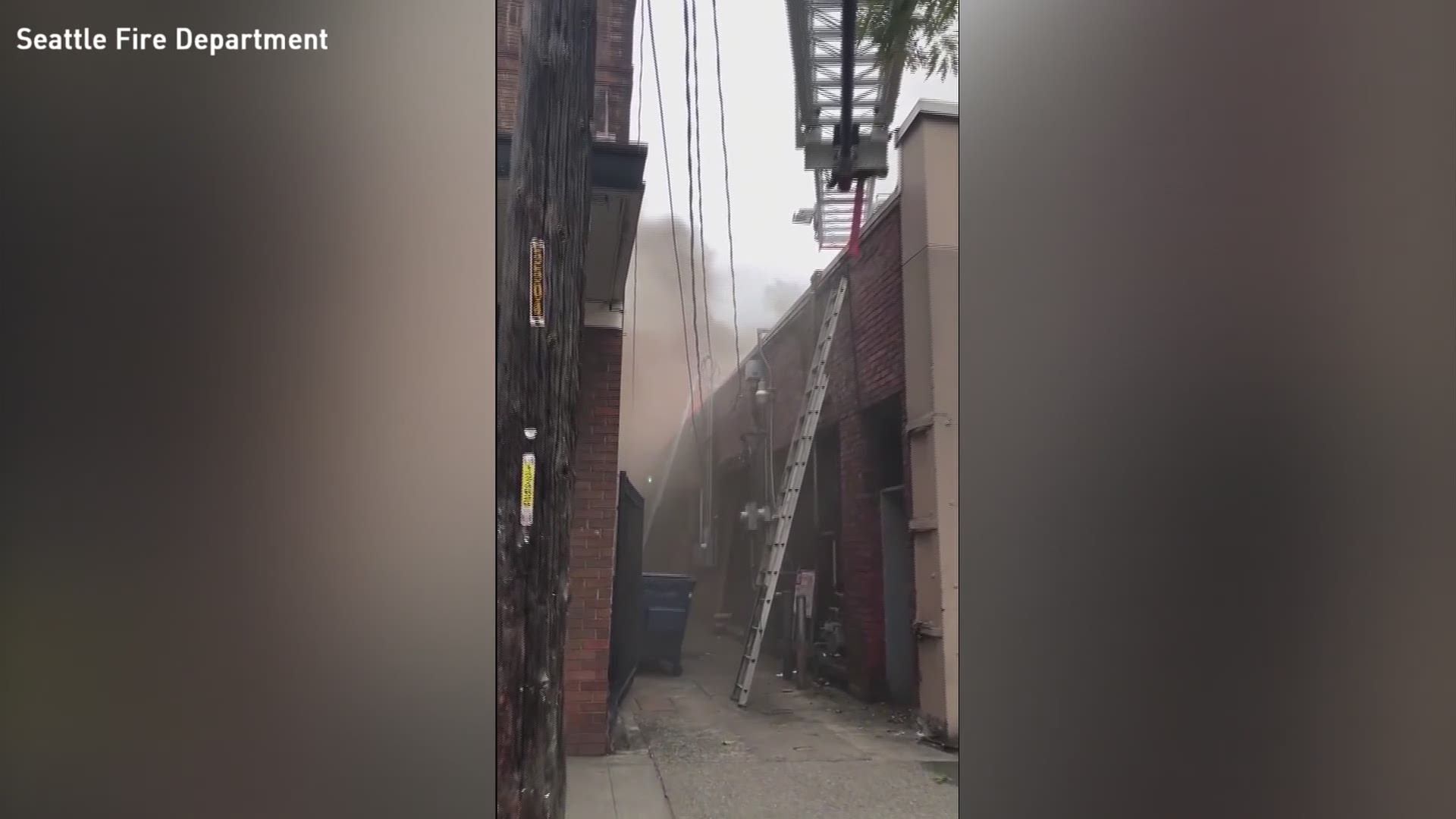 A three-alarm fire broke out in Seattle's Ballard neighborhood on Oct. 7, 2019.