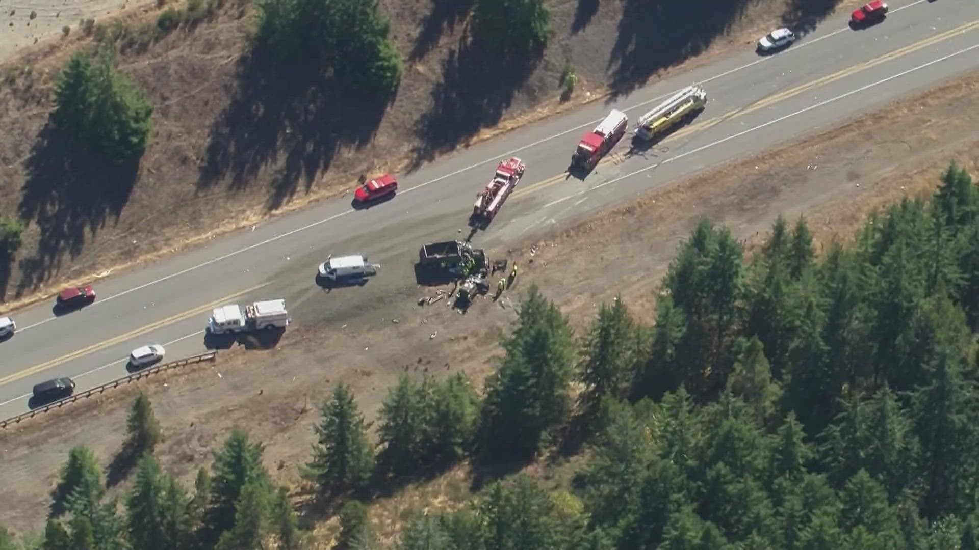 Two people were killed and two others were “seriously injured” in a head-on crash involving a commercial dump truck on US Route 101 near Shelton Wednesday morning.
