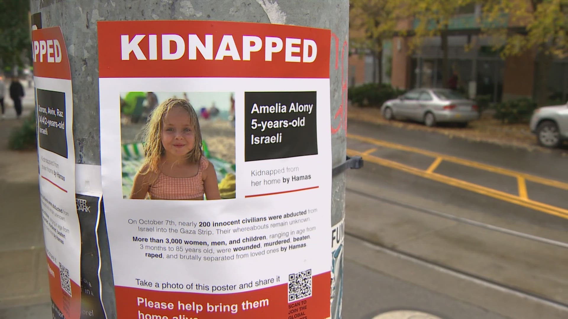 About 200 volunteers have put up thousands of posters across Seattle to spread awareness of the people missing after the Hamas attack.