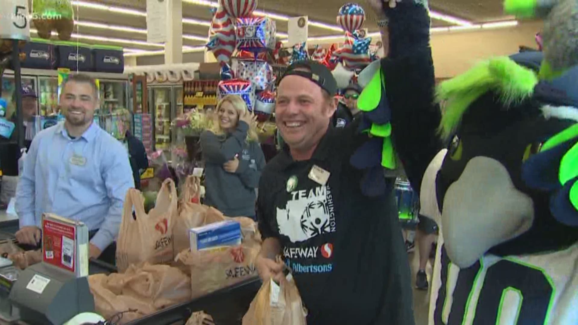Kevin Lyons plays soccer for Washington's Special Olympics and works at a local Safeway. Over Memorial Day weekend, the Seahawks and Blue Thunder surprised Lyons at work! 