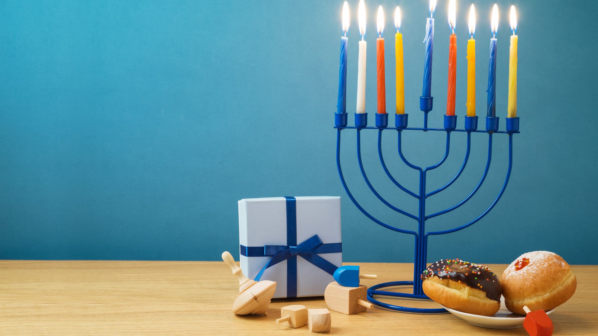 The meaning behind traditions like menorahs, dreidels, and fried foods