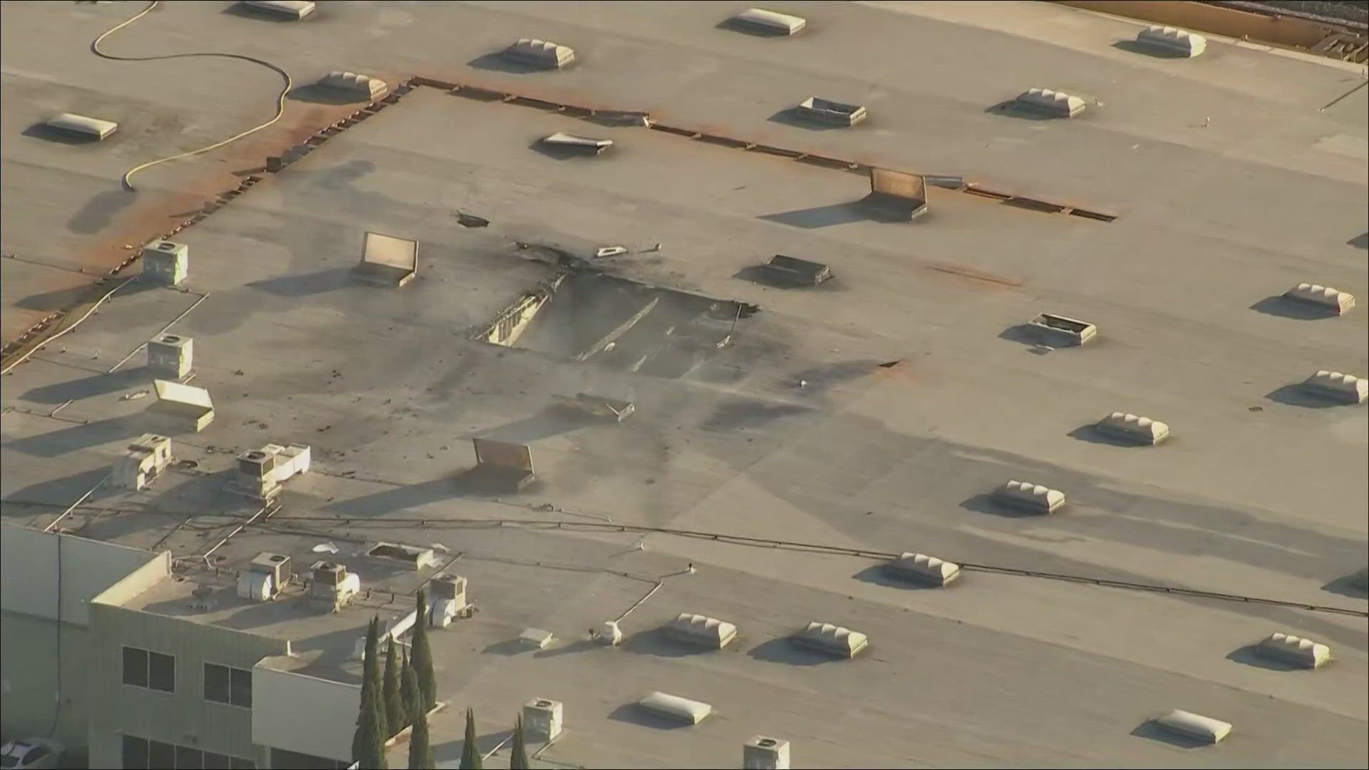 A small plane slammed into the building near the Fullerton Airport in Orange County.