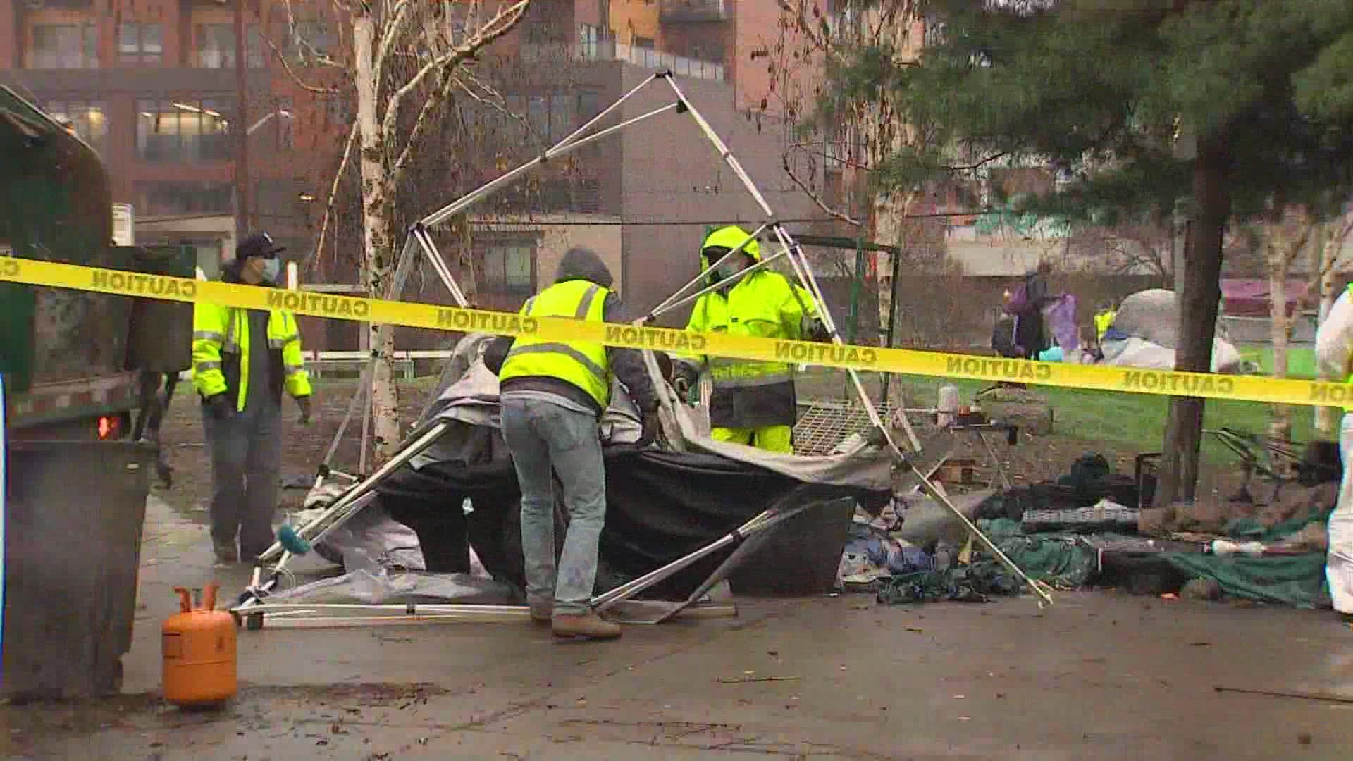 City workers cleared out a hazardous homeless camp in Seattle's Ballard neighborhood Tuesday morning