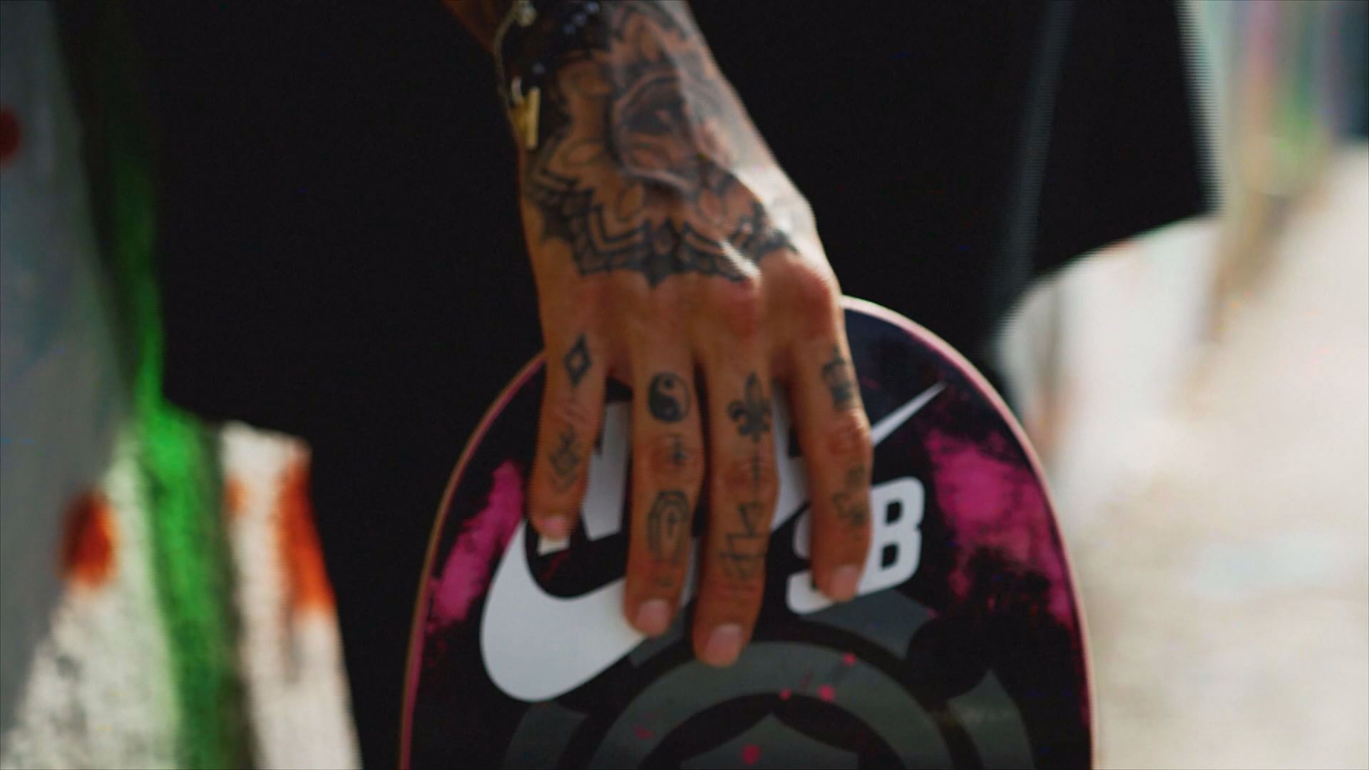 Olympic athletes show off their tattoo designs and what inspired their ink.