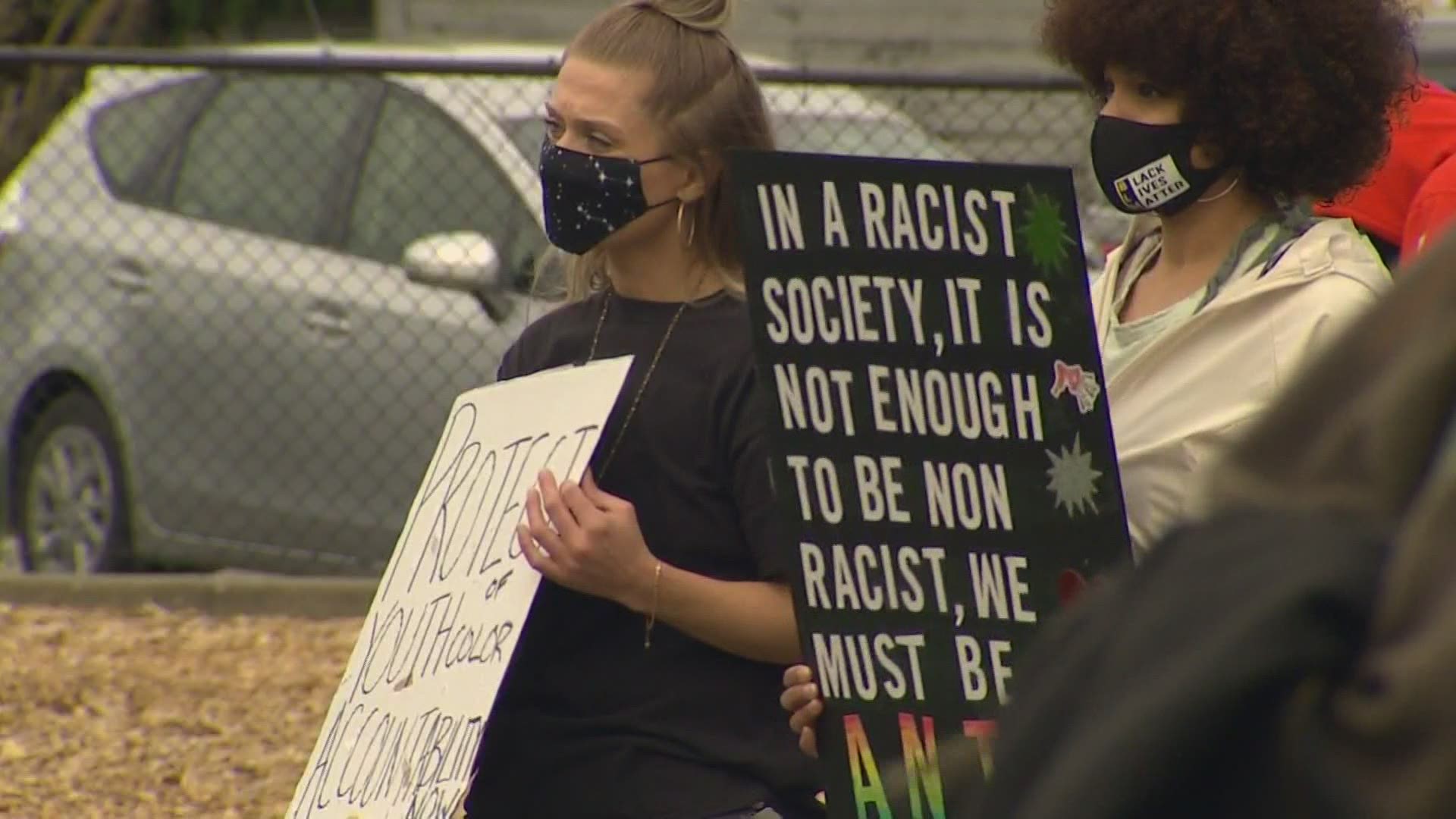 Allegations of systemic racism and a lack of leadership in the Marysville School District brought a large crowd out to a Marysville Park Saturday.