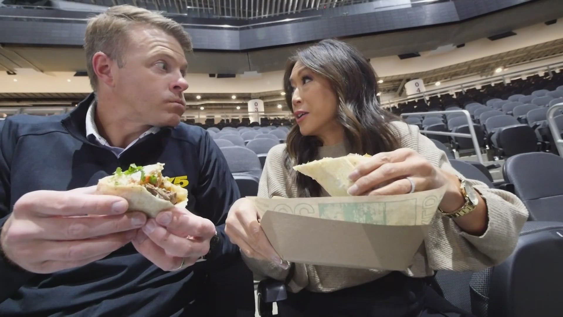 Mimi Jung and Jake Whittenberg test out some of the new menu offerings at Climate Pledge Arena ahead of the Kraken season opener