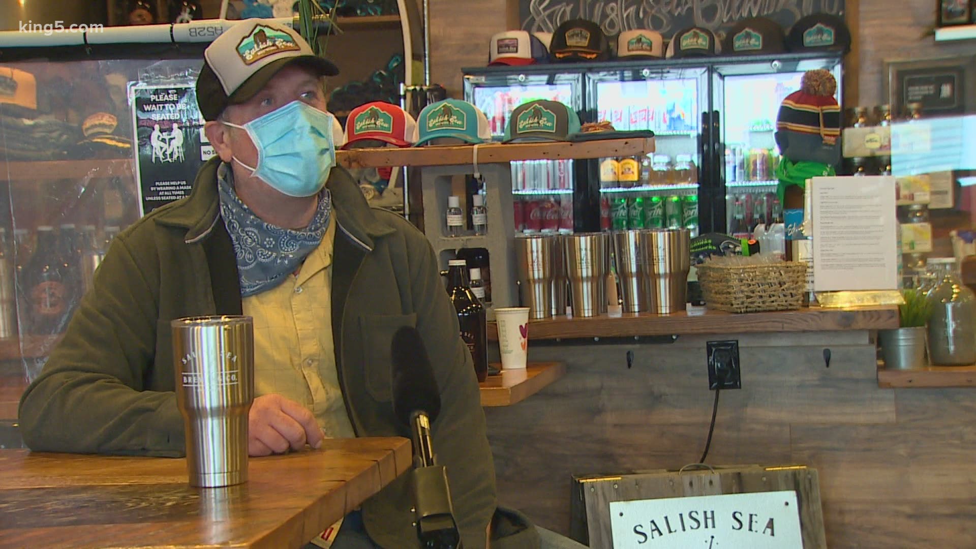 With news of restrictions on bars and restaurants, the owner at Salish Sea Brewing was forced to lay off four of his 18 employees.