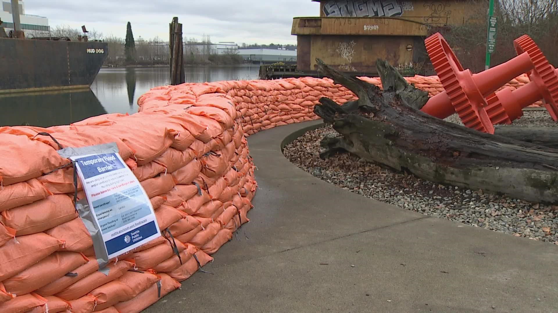 Forklifts carrying sandbags have been running nonstop, creating a barrier not just on the Duwamish but in alley’s and at people’s front doors.
