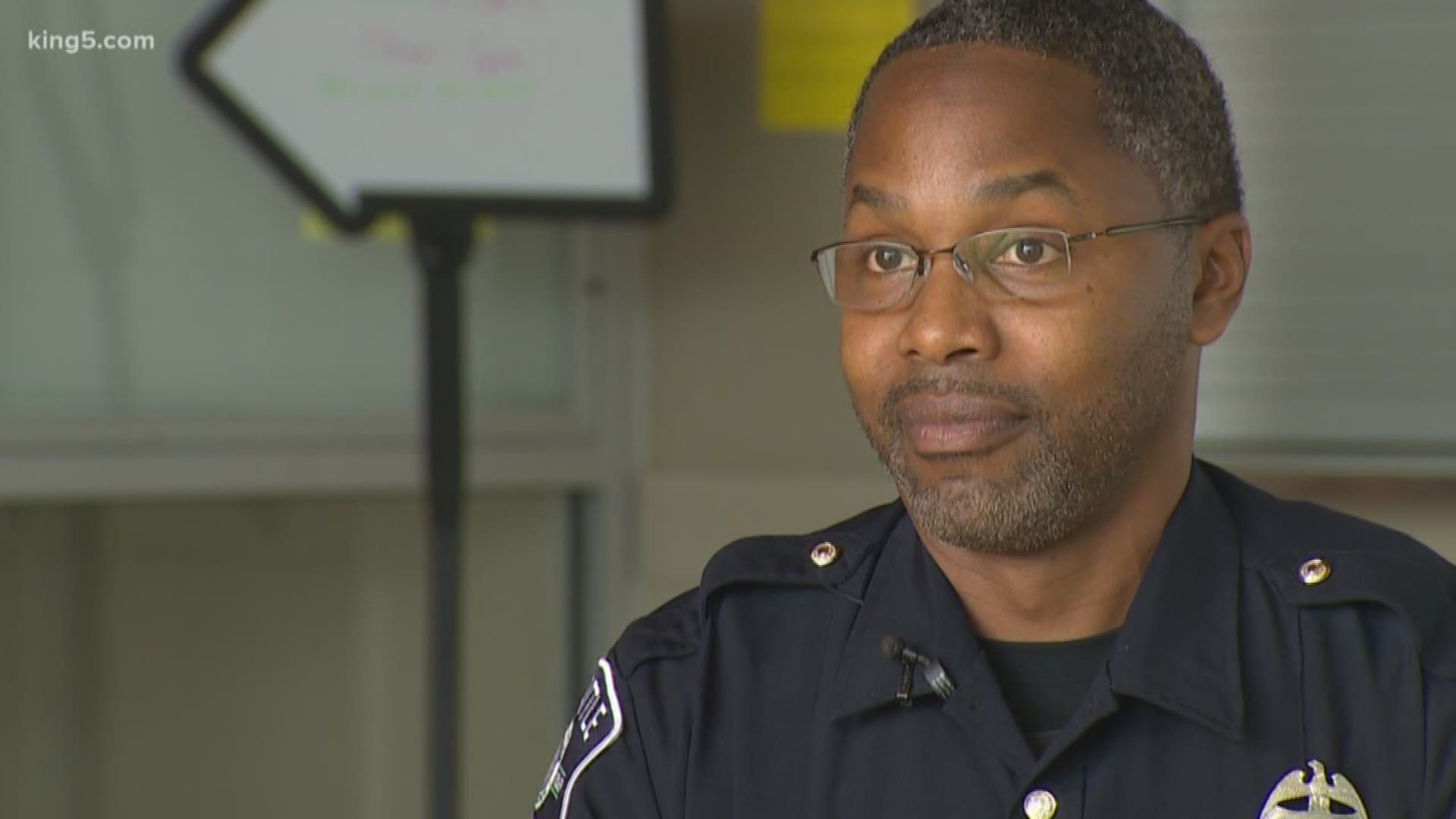 A Seattle Police officer is using his skills as a barber to help foster community and conversation in Seattle.