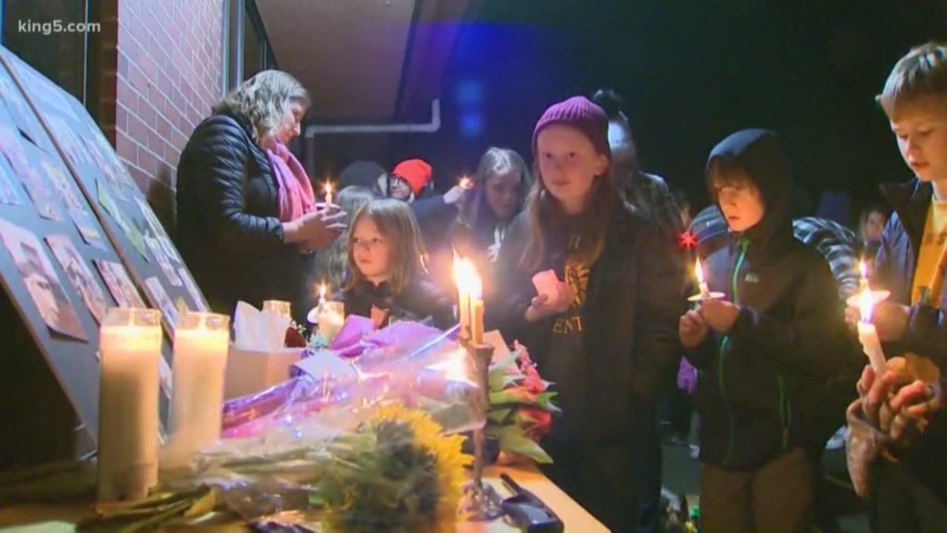 A vigil was held for a principal who was shot dead in her home on Thursday.