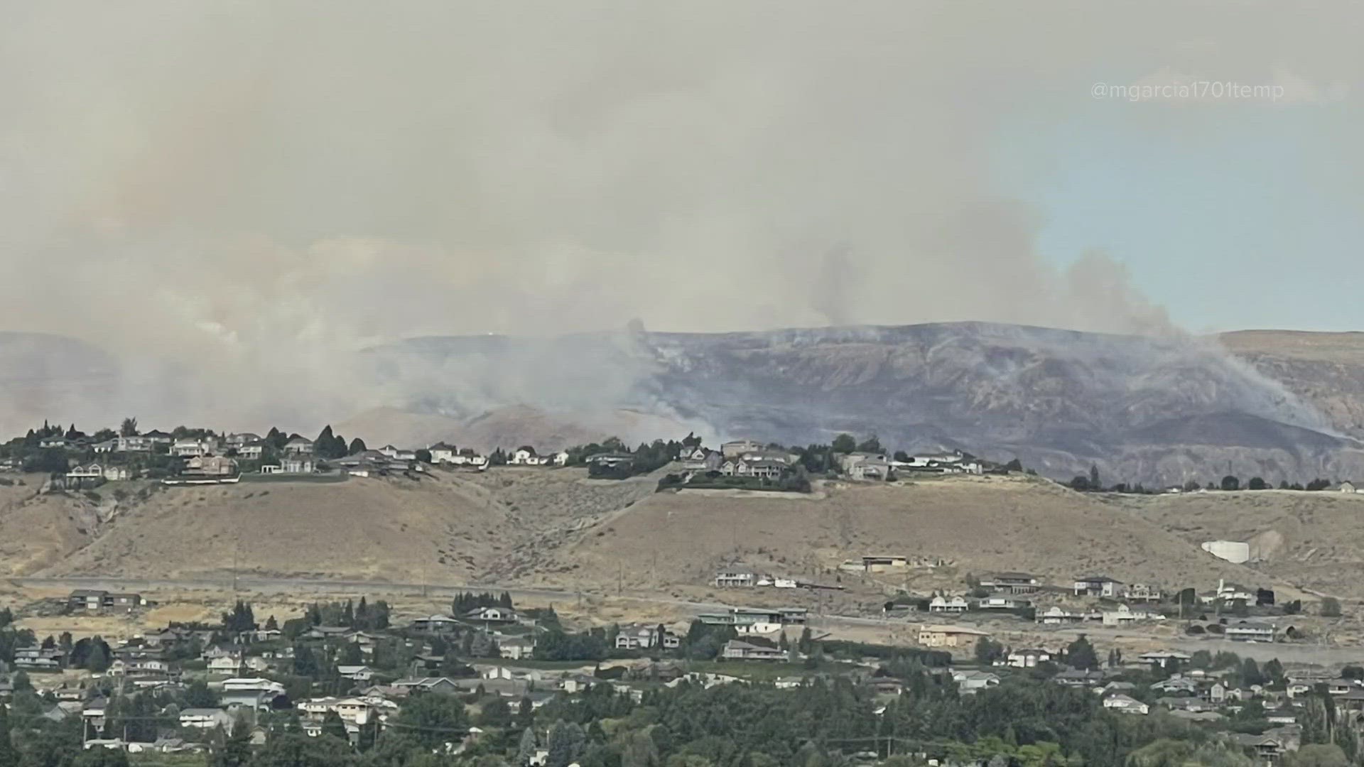 A wildfire burning near East Wenatchee in Douglas County grew to an estimated 700 acres in about four hours on Thursday, July 20.