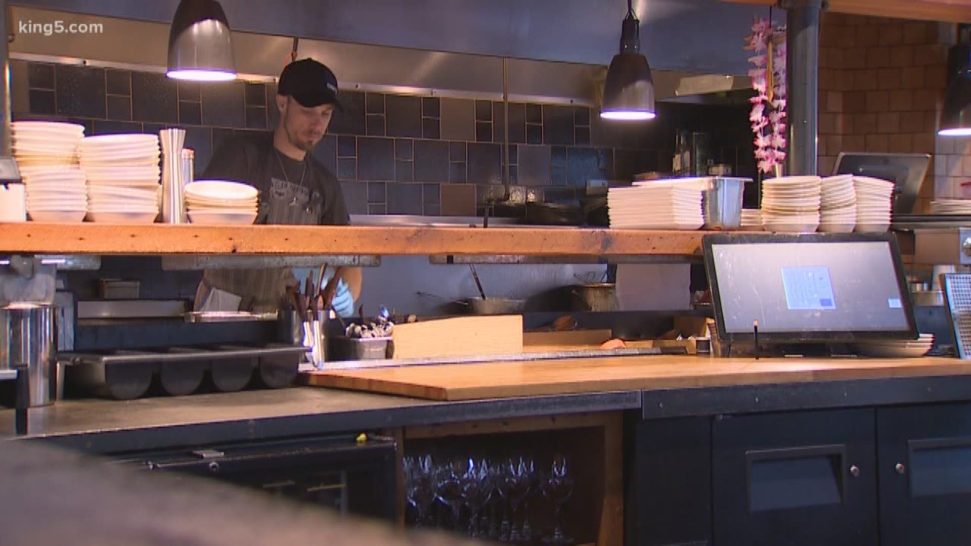Restaurant owners are having to adjust to keep themselves in business following the city's minimum wage requirements.