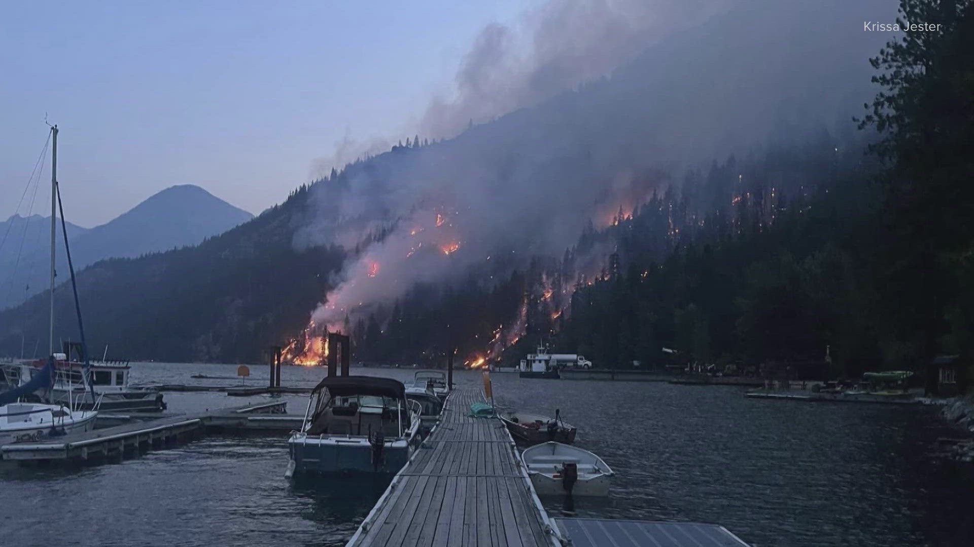 The fire, which has burned more than 37,000 acres, has reached the road near the marina in Stehekin but firefighters are holding the line.