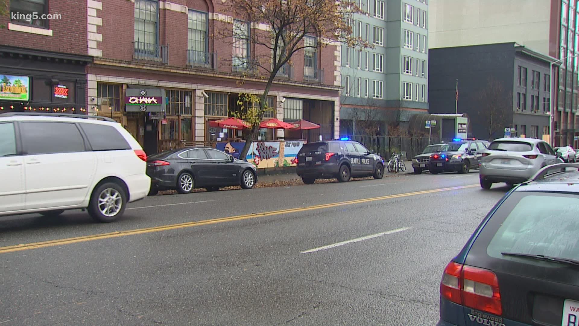 The stabbing occurred in the 2200 block of First Avenue in Seattle's Belltown neighborhood Monday morning. Police are searching for the suspect.